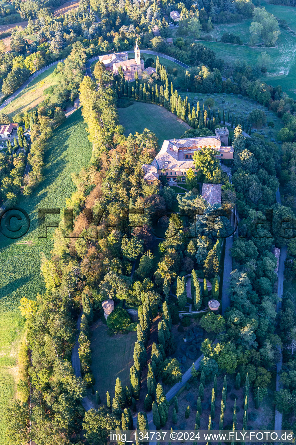 Church of the Nativity of the Beata Vergine Maria in the district Chiesa Albinea in Albinea in the state Reggio Emilia, Italy seen from above