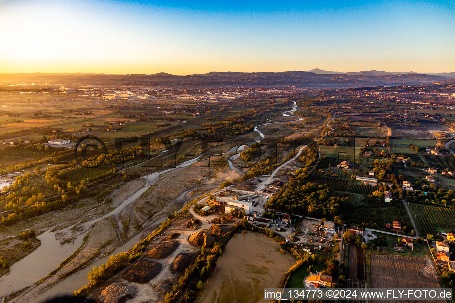 Sunrise over the Secchia River at Casalgrande Emiliana Conglomerati in Casalgrande in the state Reggio Emilia, Italy