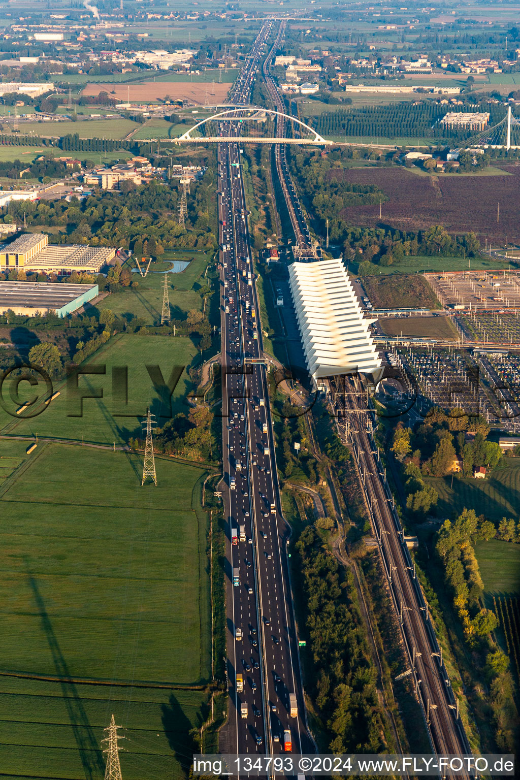 Aerial view of Reggio Emilia AV Mediopadana train station in Reggio nell’Emilia in the state Reggio Emilia, Italy