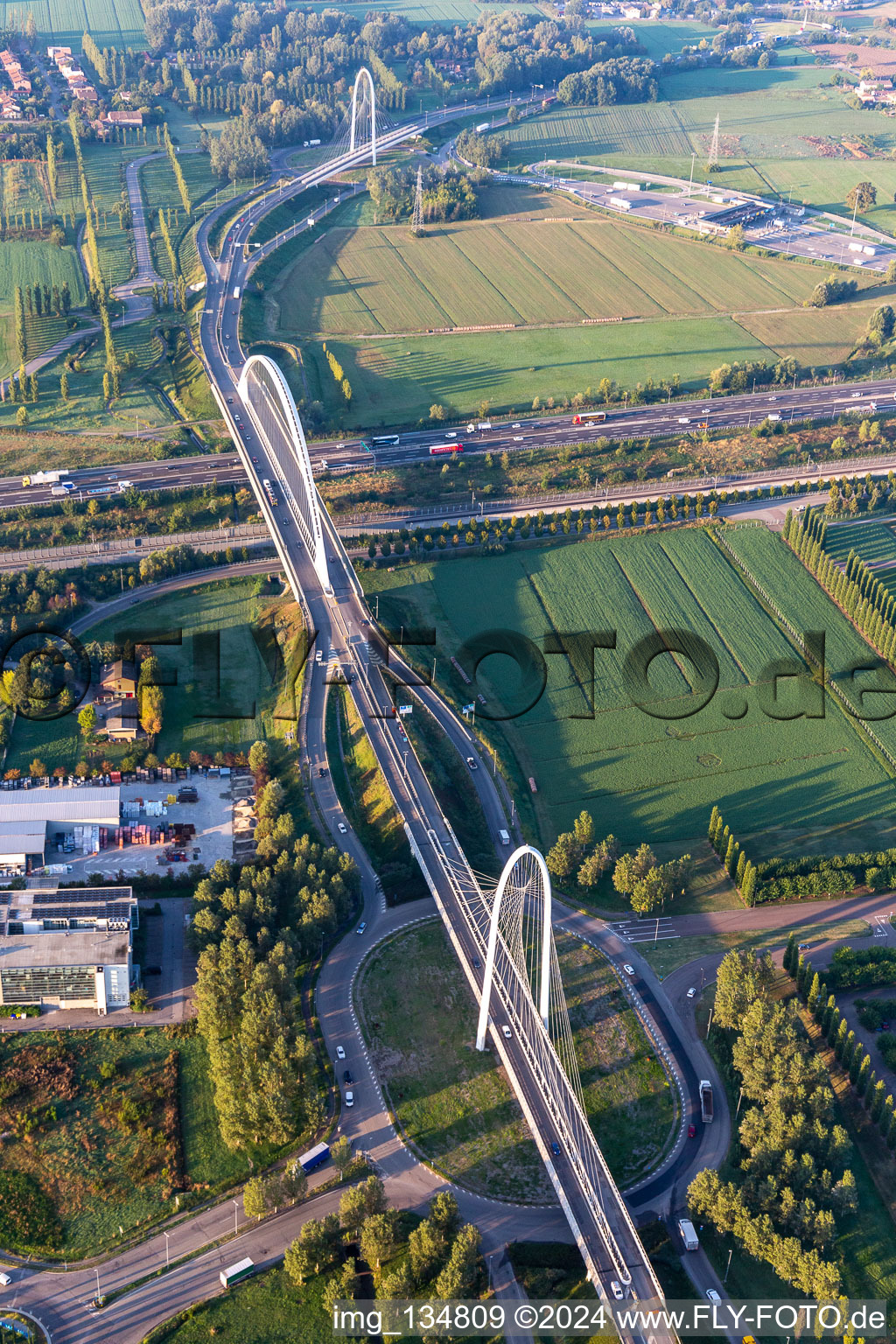 Aerial view of Bridges Ponte Di Calatrava, Vela di Calatrava NORTH and SOUTH over the high-speed railway line and Autostrada del Sole in Reggio nell’Emilia in the state Reggio Emilia, Italy