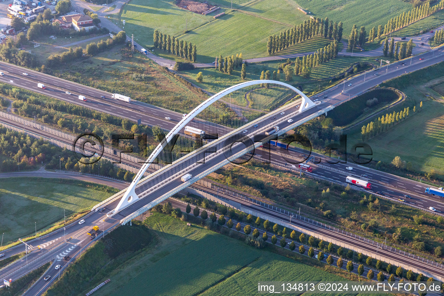 Aerial view of Ponte Di Calatrava bridge, over the high-speed railway line and Autostrada del Sole in Reggio nell’Emilia in the state Reggio Emilia, Italy