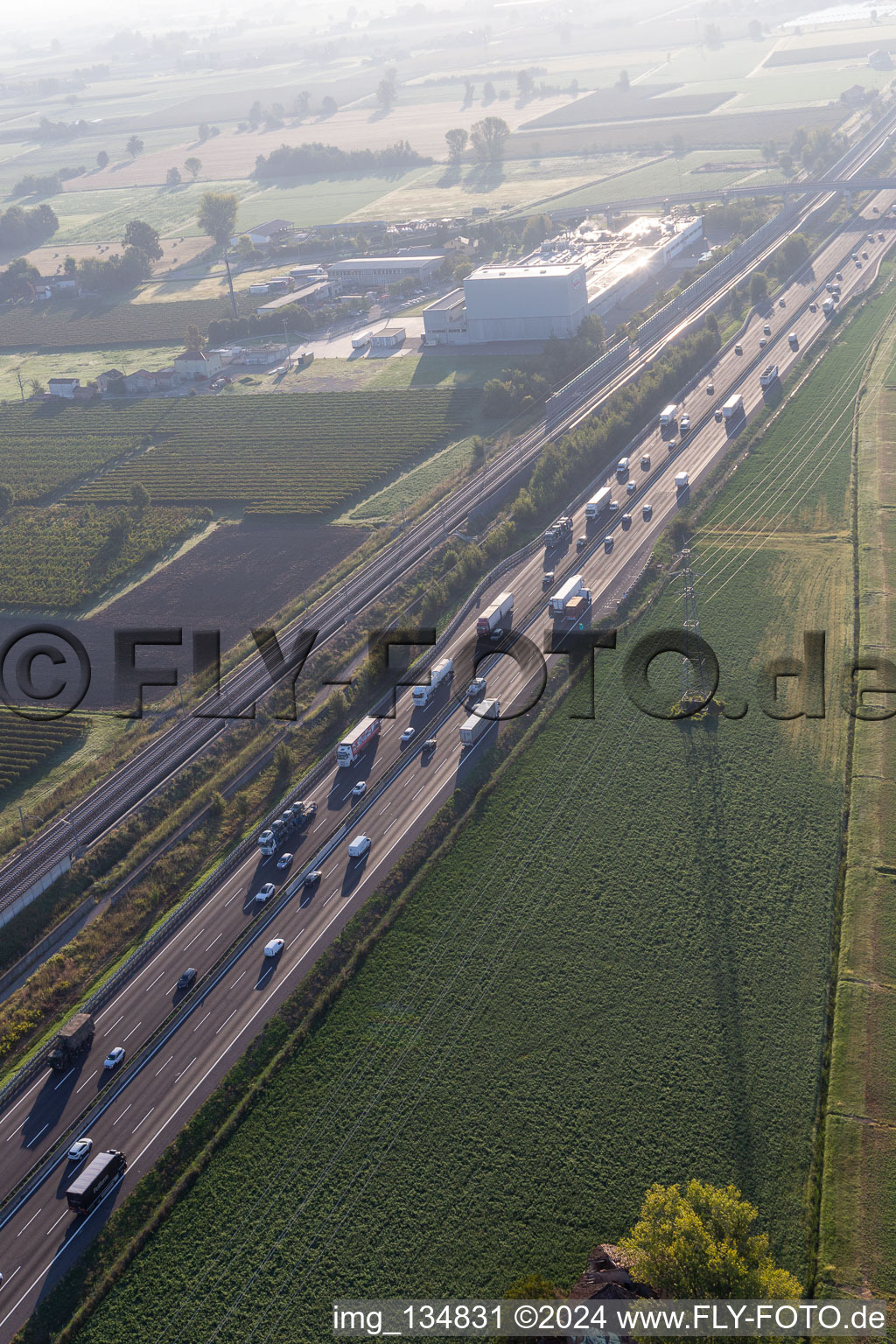 Autostrada del Sole next to the express train line in San Martino in Rio in the state Reggio Emilia, Italy