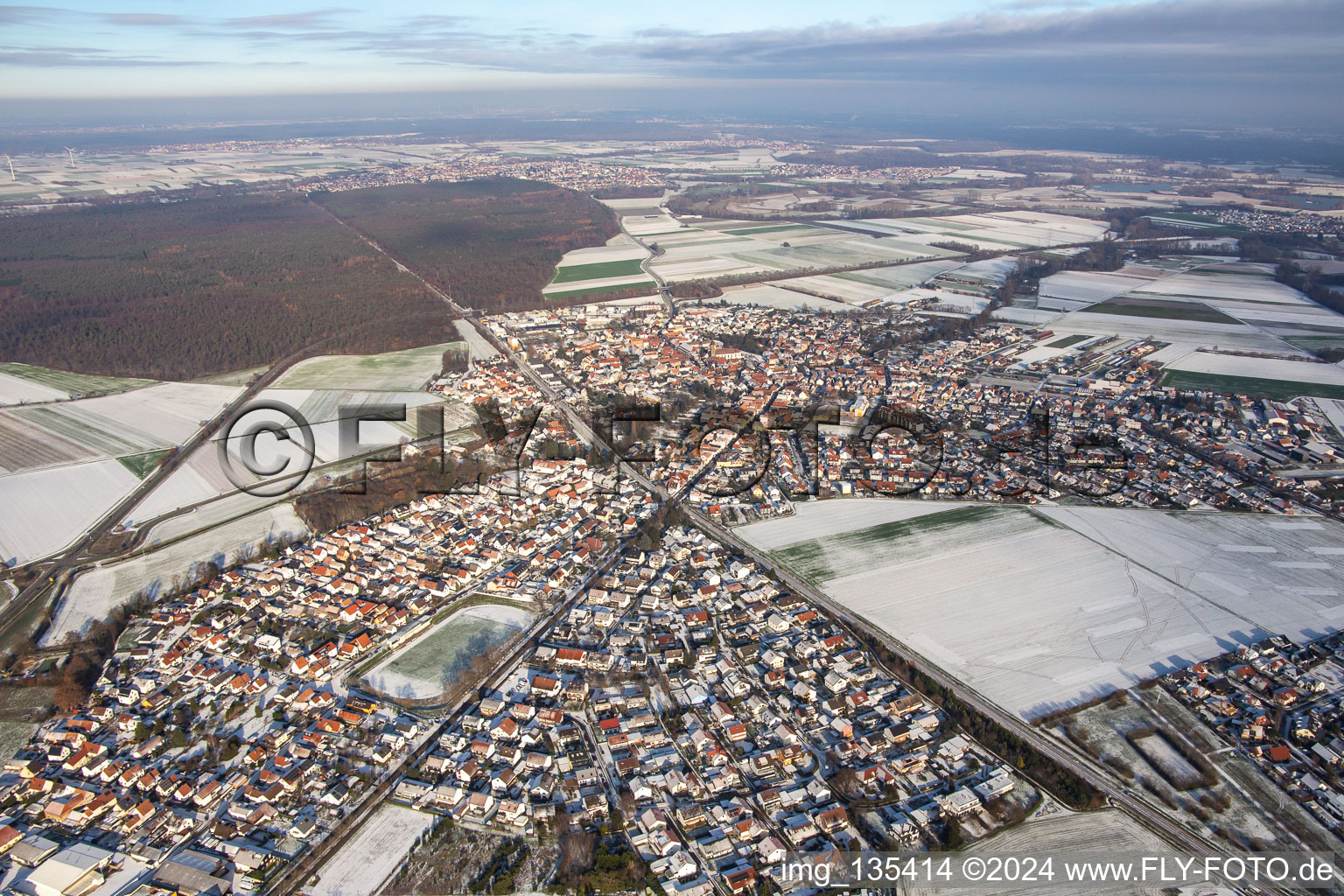 Railway line in winter with snow in Rheinzabern in the state Rhineland-Palatinate, Germany