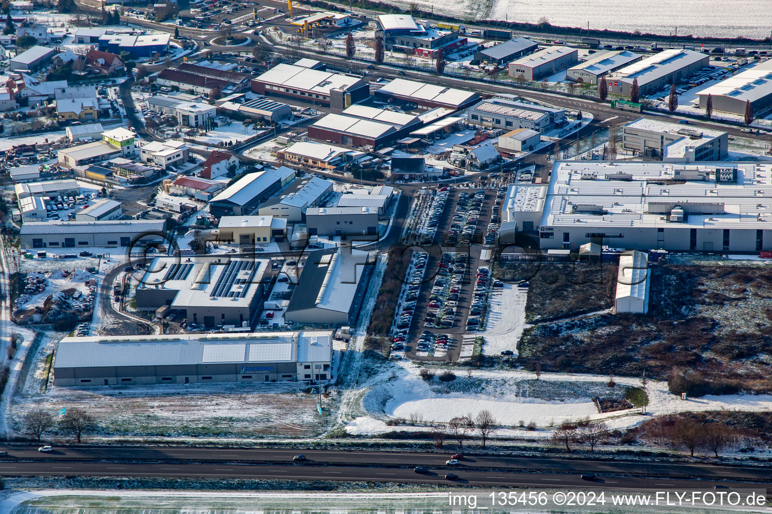 DBK and Bartmann Maschinenbau in winter in snow in Rülzheim in the state Rhineland-Palatinate, Germany