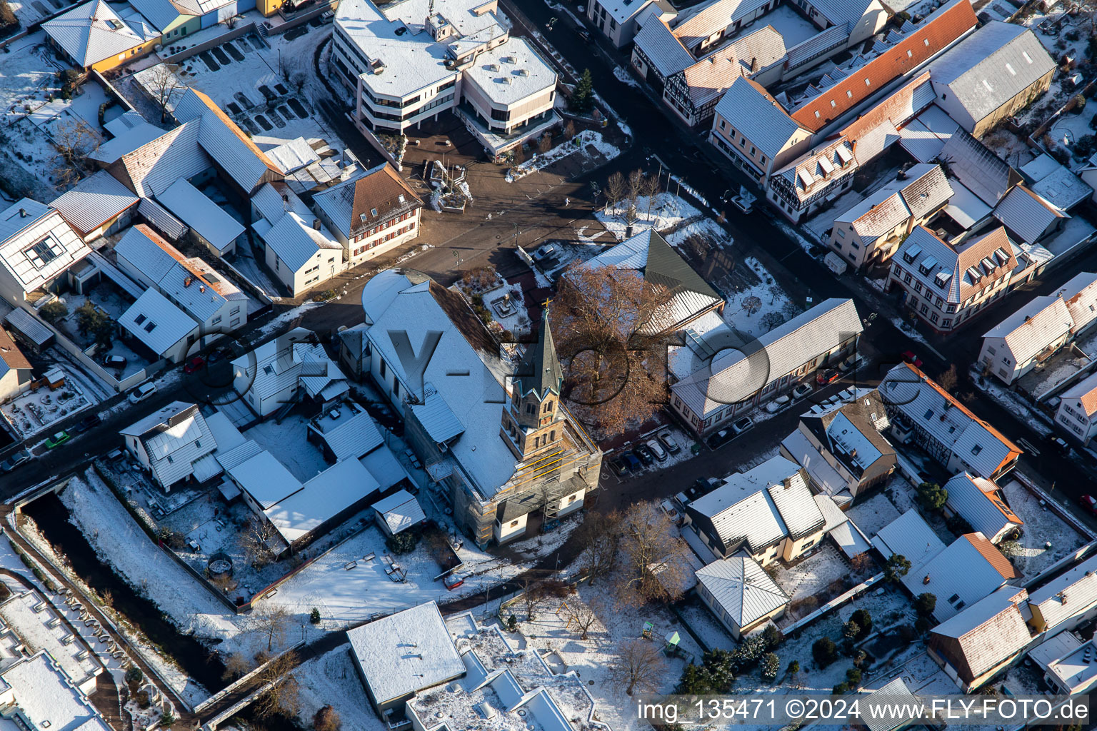 St. Mauritius Church in winter with snow in Rülzheim in the state Rhineland-Palatinate, Germany