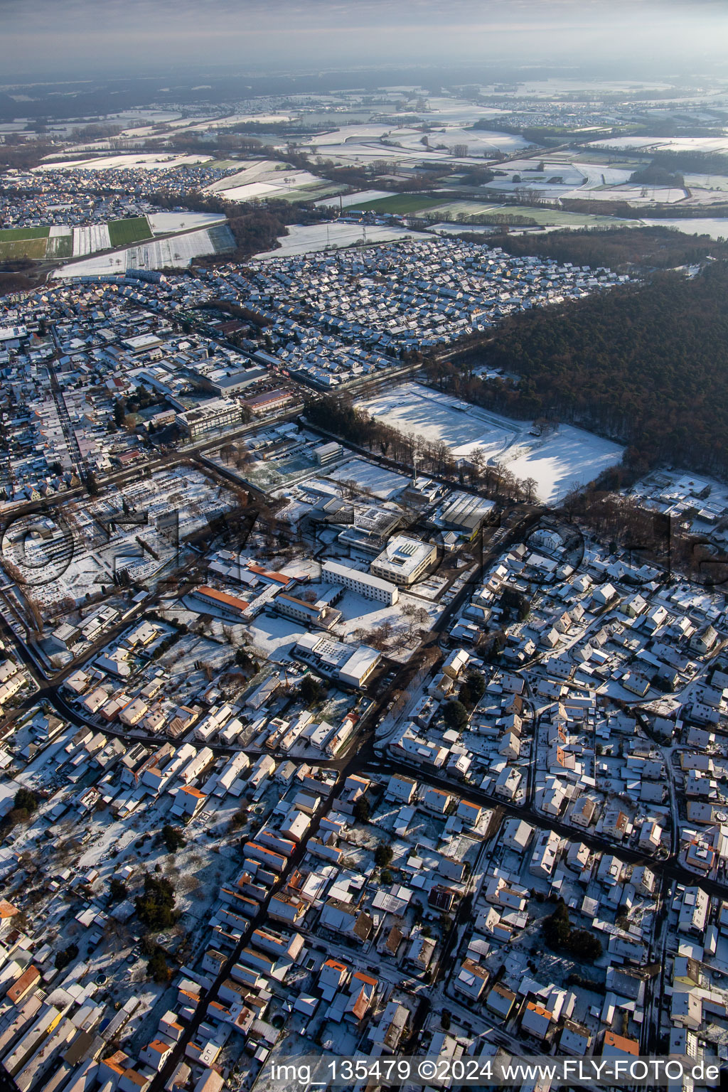 Aerial view of IGS -Rülzheim in winter with snow in Rülzheim in the state Rhineland-Palatinate, Germany