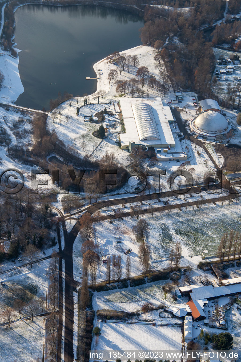 Aerial view of Lido, steam dumpling hall in winter when there is snow in Rülzheim in the state Rhineland-Palatinate, Germany