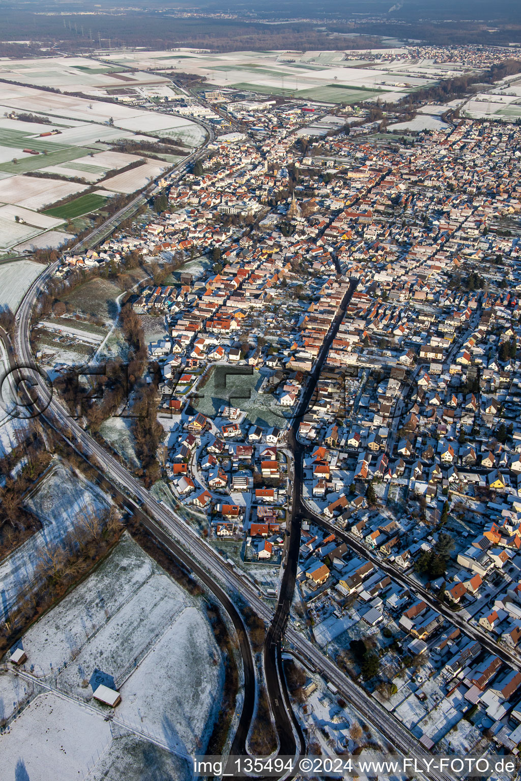 Aerial photograpy of From the west in winter when there is snow in Rülzheim in the state Rhineland-Palatinate, Germany