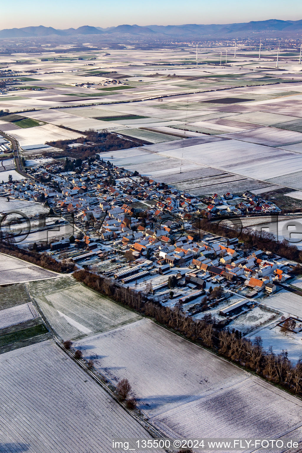 Aerial view of In winter when there is snow in Herxheimweyher in the state Rhineland-Palatinate, Germany