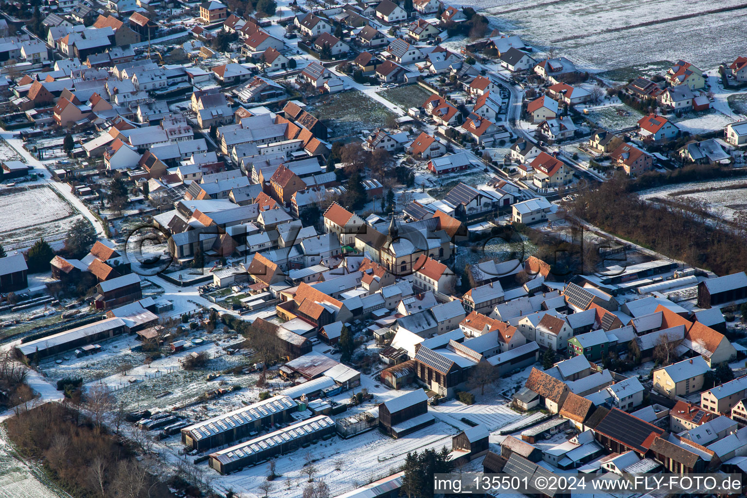 Church of St. Antonius in winter with snow in Herxheimweyher in the state Rhineland-Palatinate, Germany