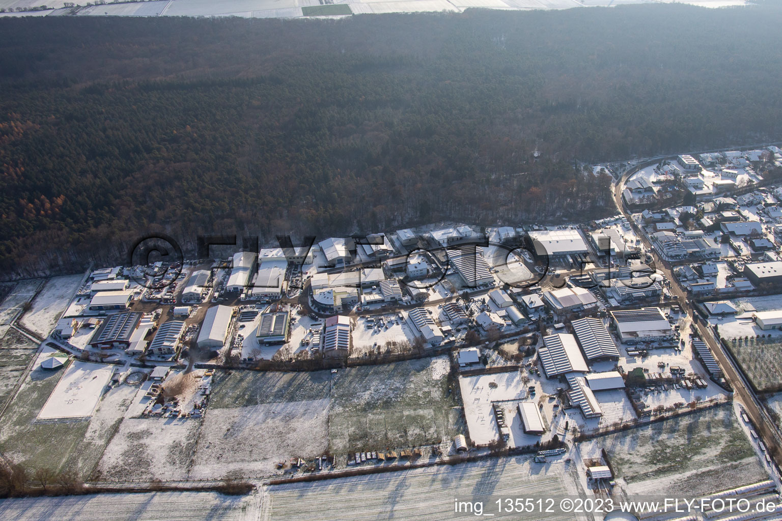 Am Gäxwald commercial area in winter with snow in the district Herxheim in Herxheim bei Landau in the state Rhineland-Palatinate, Germany