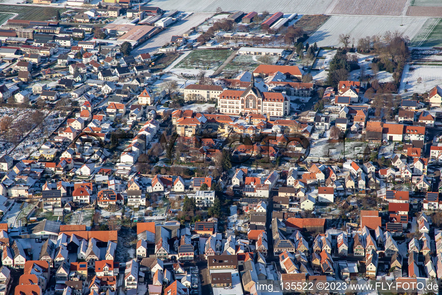 St. Paulus-Stift in winter with snow in the district Herxheim in Herxheim bei Landau/Pfalz in the state Rhineland-Palatinate, Germany