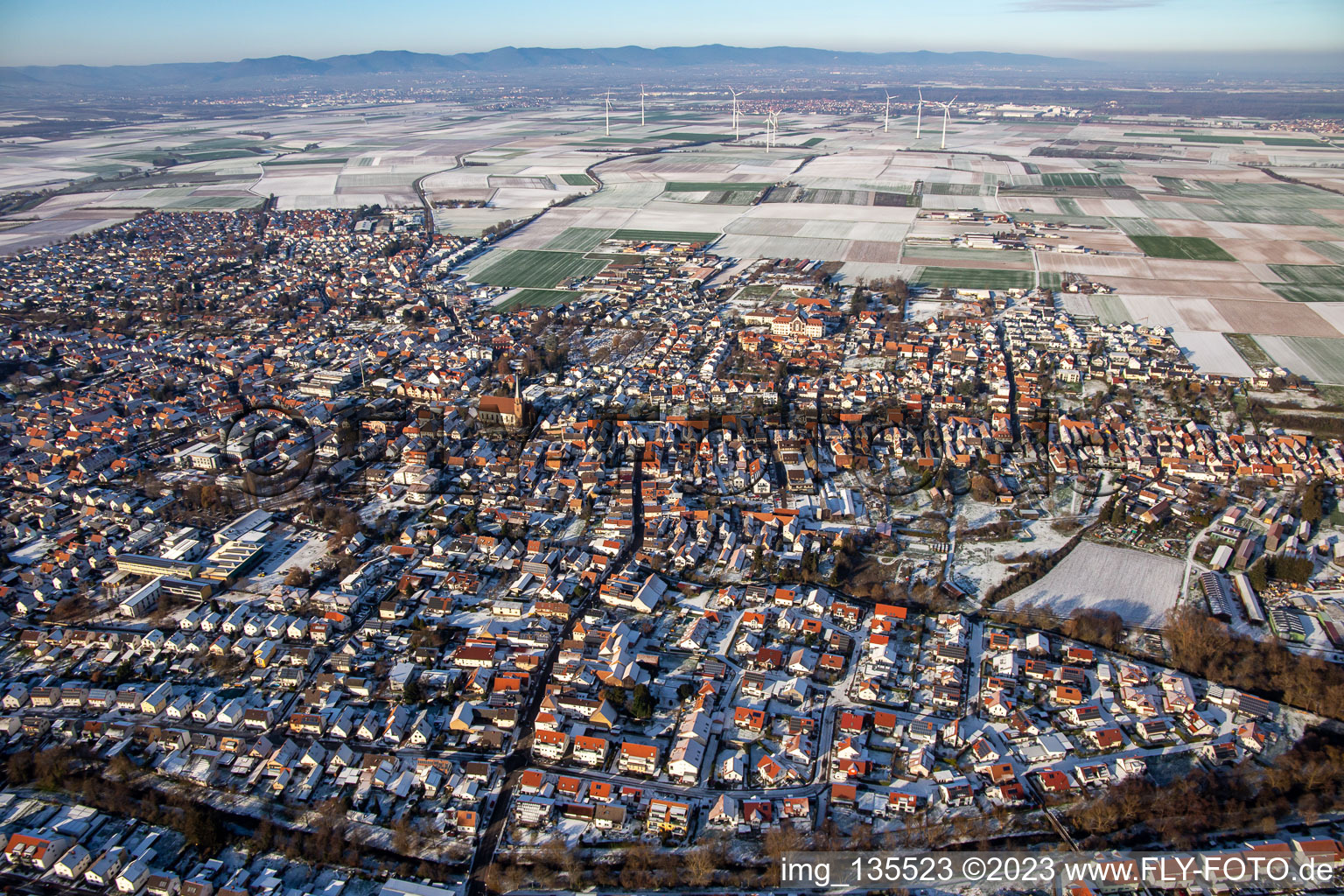 Aerial view of In winter when there is snow in the district Herxheim in Herxheim bei Landau/Pfalz in the state Rhineland-Palatinate, Germany