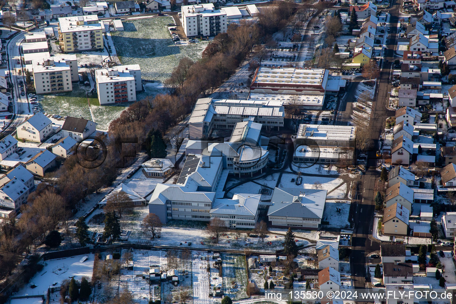 Gymnasium in the PAMINA school center in winter with snow in the district Herxheim in Herxheim bei Landau in the state Rhineland-Palatinate, Germany