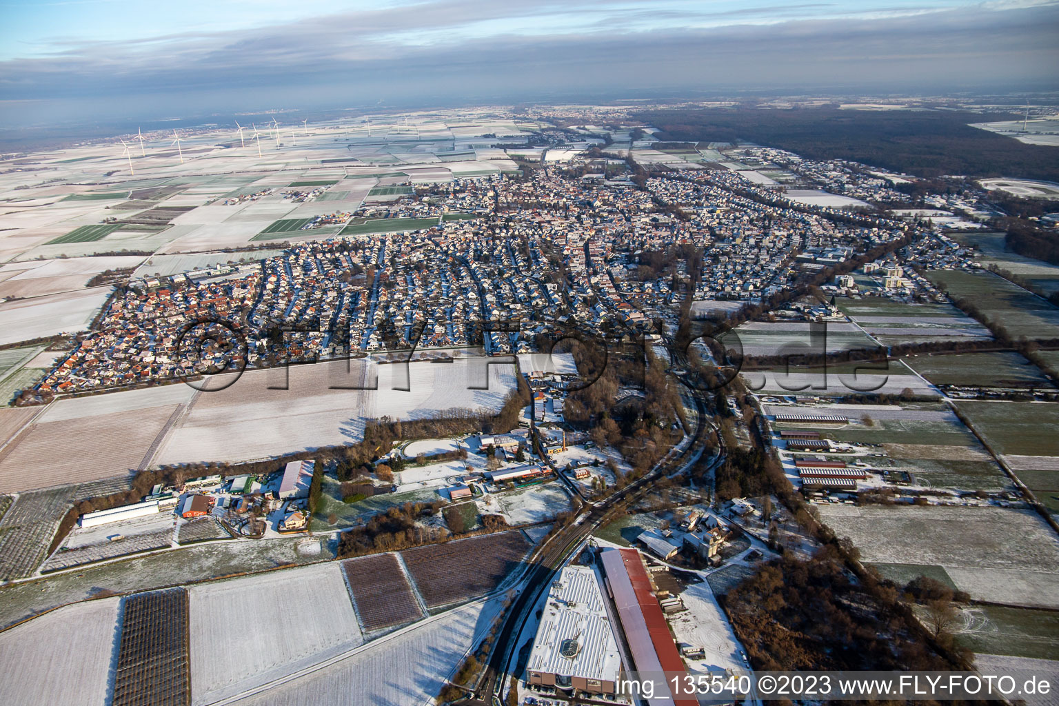 From the west in winter when there is snow in the district Herxheim in Herxheim bei Landau in the state Rhineland-Palatinate, Germany