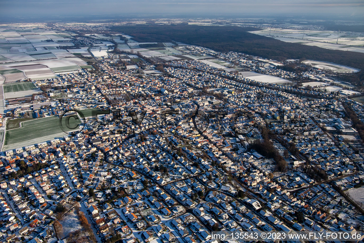 From the northwest in winter when there is snow in the district Herxheim in Herxheim bei Landau in the state Rhineland-Palatinate, Germany