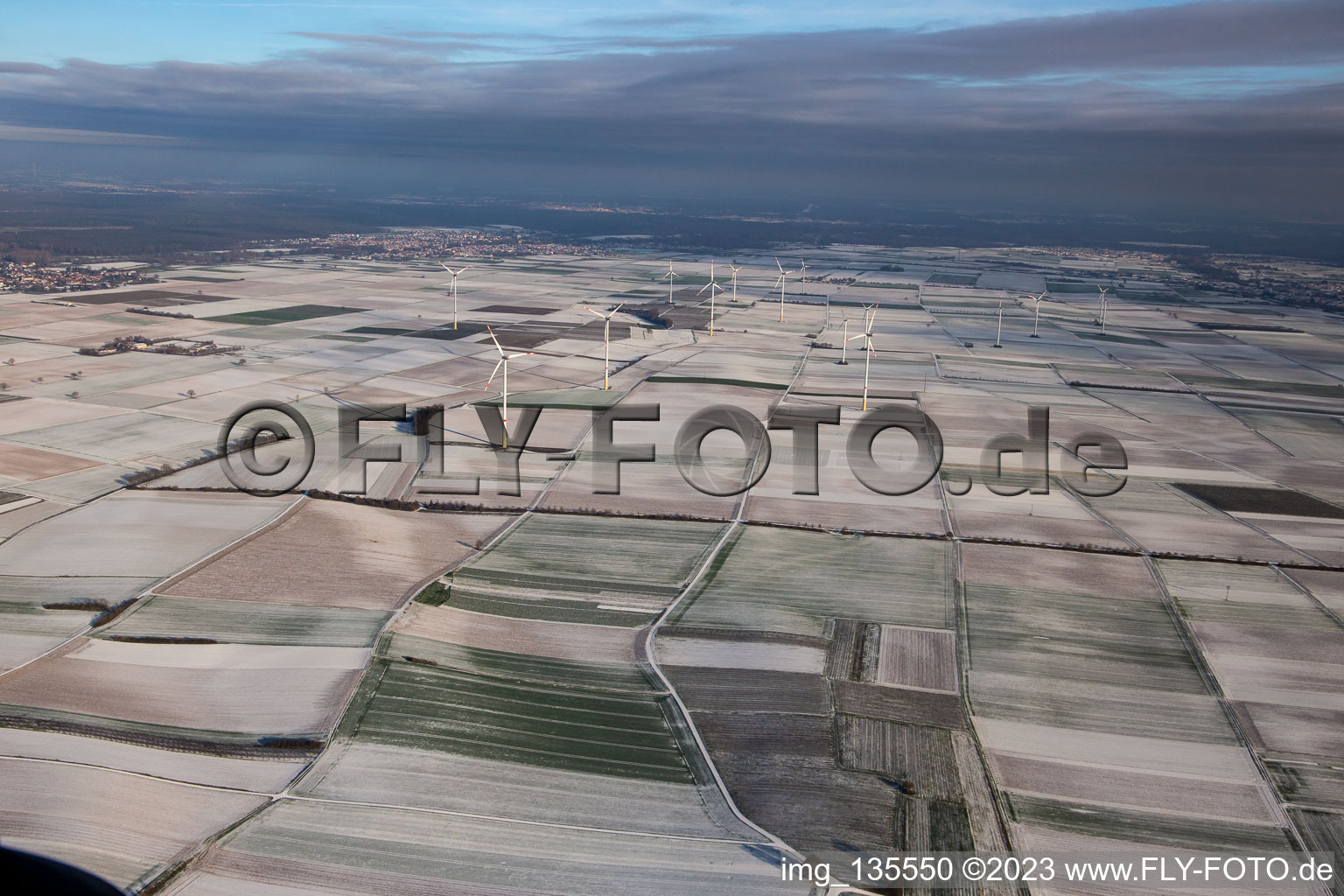 Aerial view of Wind farm in winter with snow in Offenbach an der Queich in the state Rhineland-Palatinate, Germany