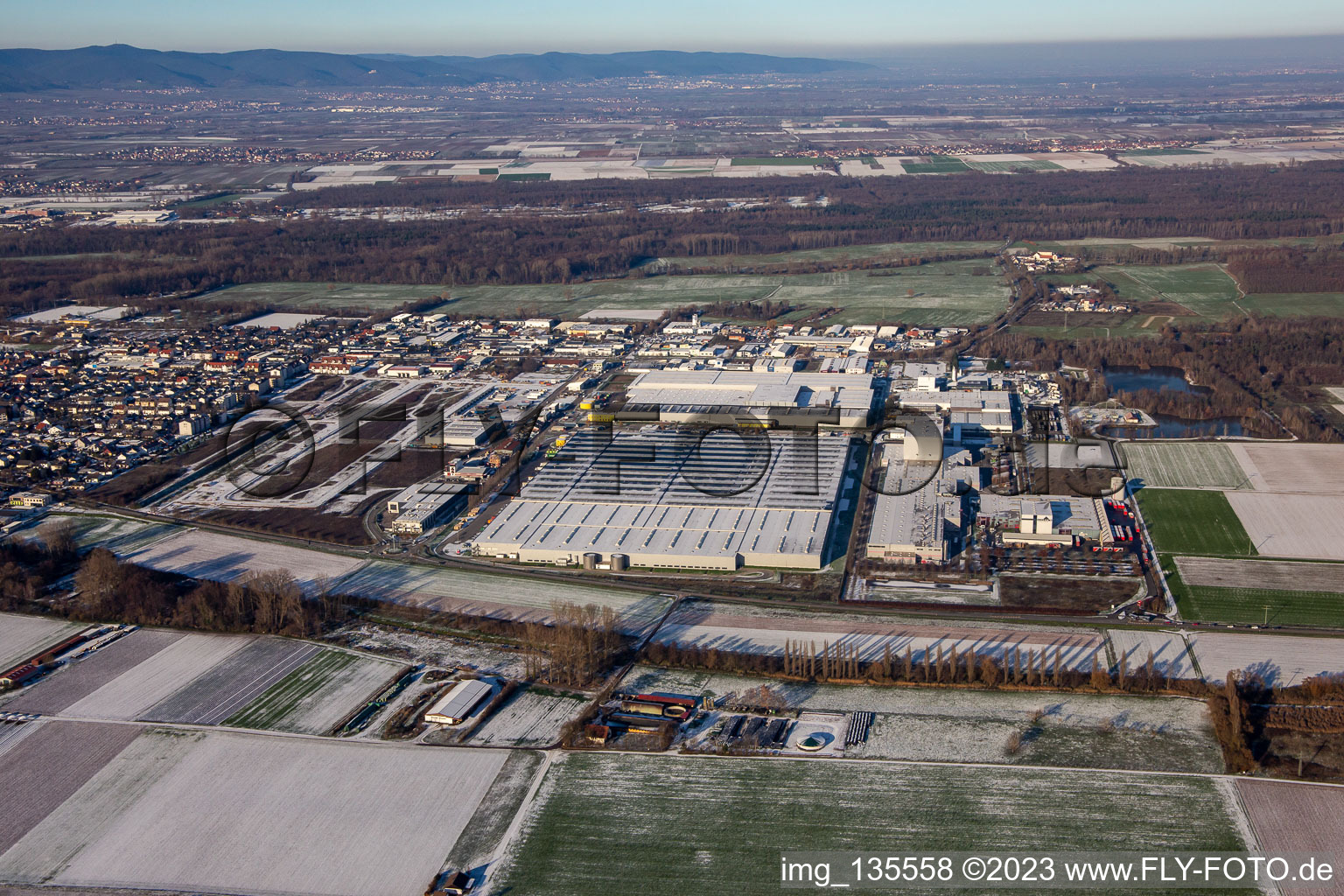 Aerial view of Interpark industrial area in winter with snow in Offenbach an der Queich in the state Rhineland-Palatinate, Germany