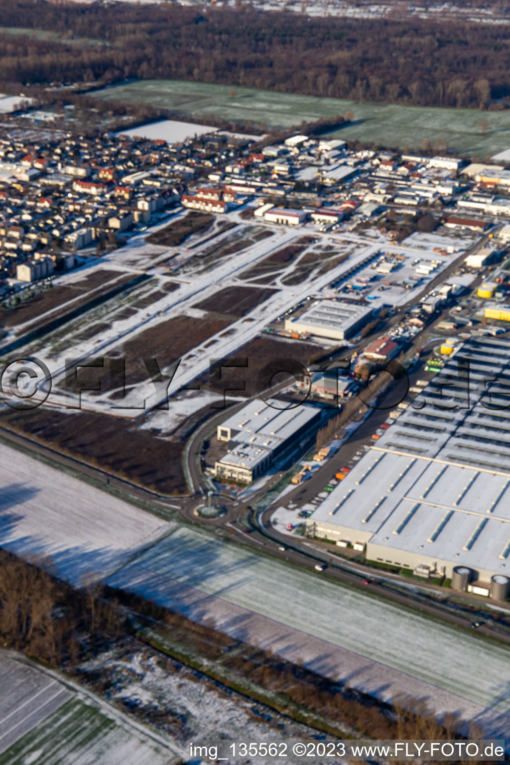 Aerial photograpy of Interpark industrial area in winter with snow in Offenbach an der Queich in the state Rhineland-Palatinate, Germany