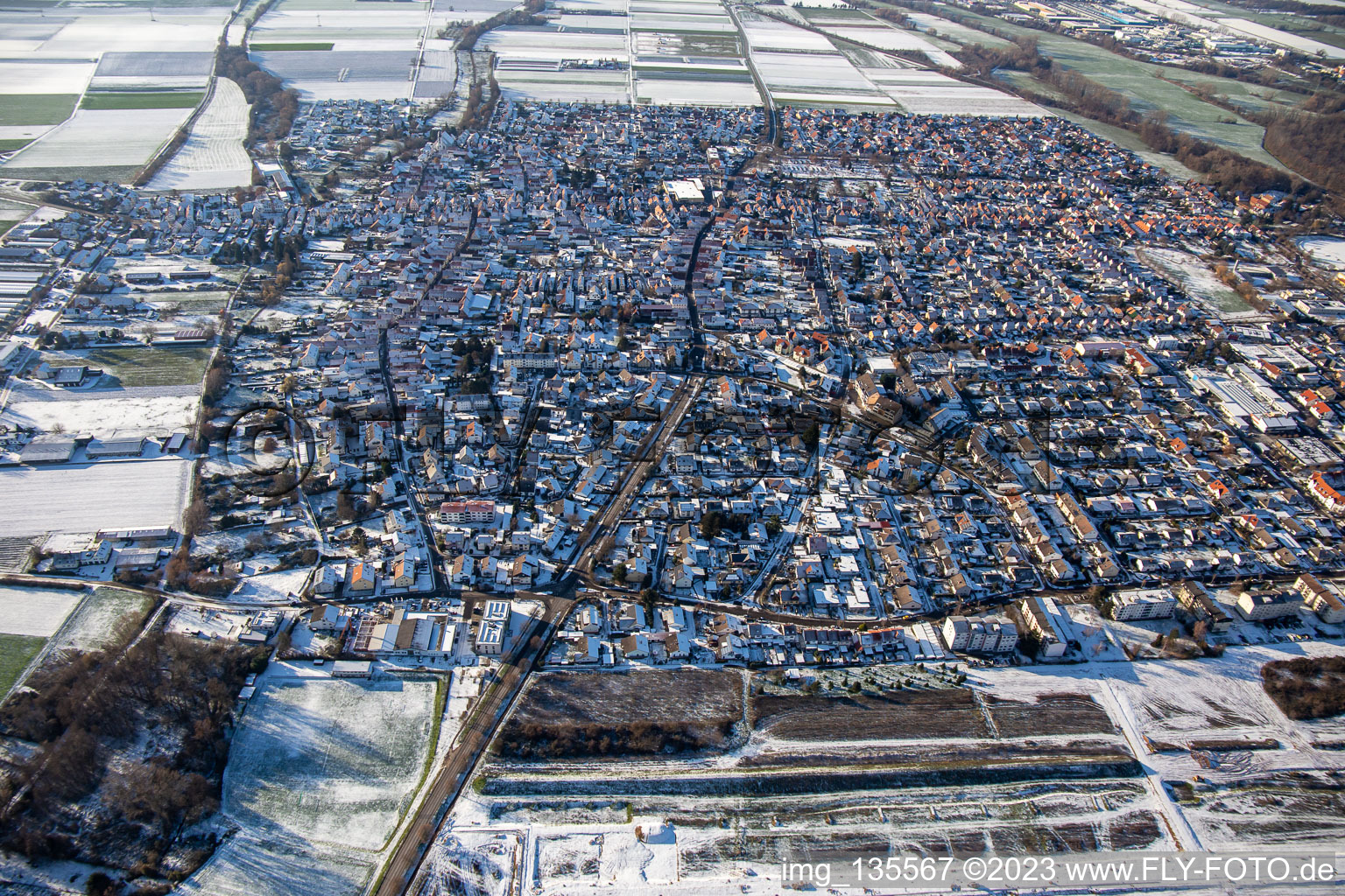 Aerial view of Germersheimer Straße from the east in winter with snow in Offenbach an der Queich in the state Rhineland-Palatinate, Germany