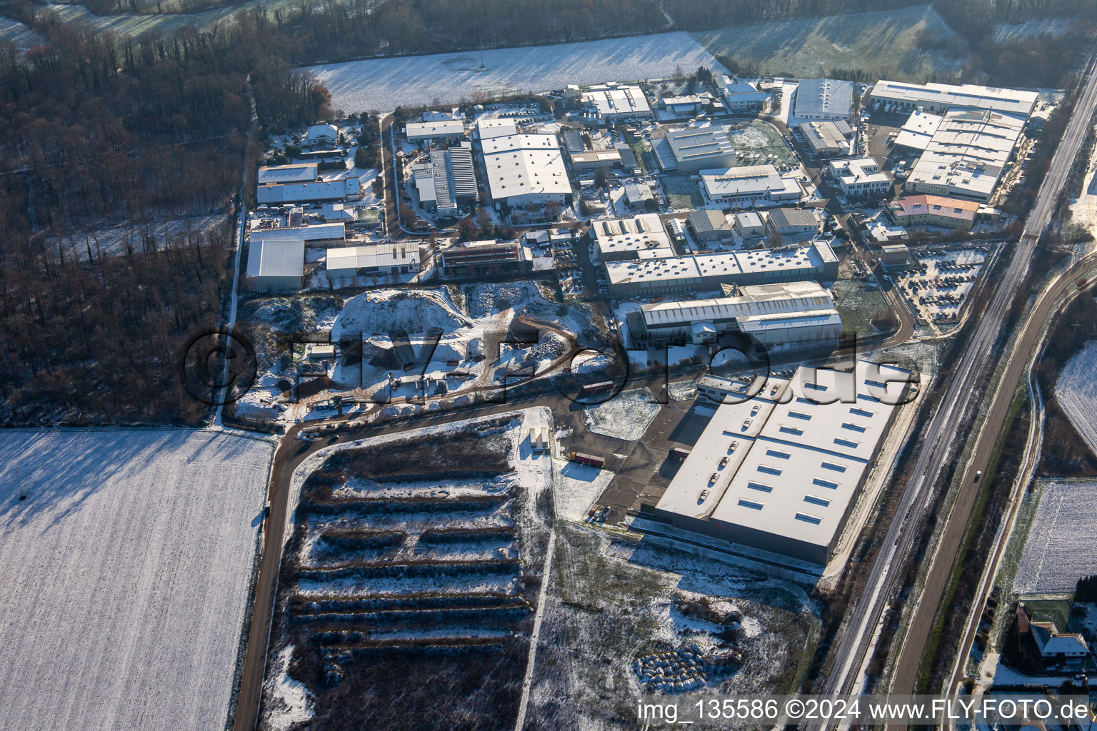 Große Ahlmühle commercial area in winter with snow in Rohrbach in the state Rhineland-Palatinate, Germany