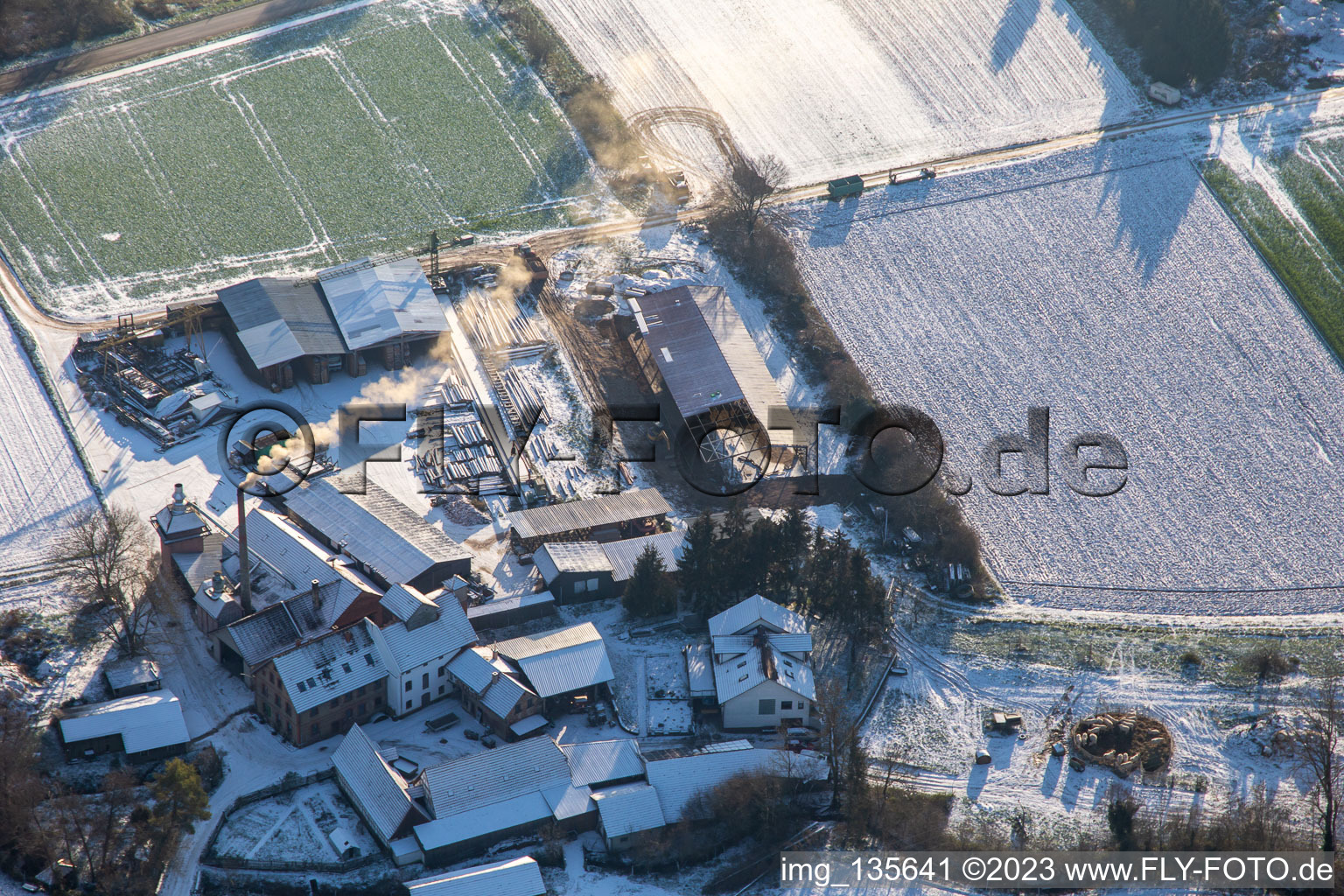 Aerial view of ORTH woodworks in winter with snow in the district Schaidt in Wörth am Rhein in the state Rhineland-Palatinate, Germany