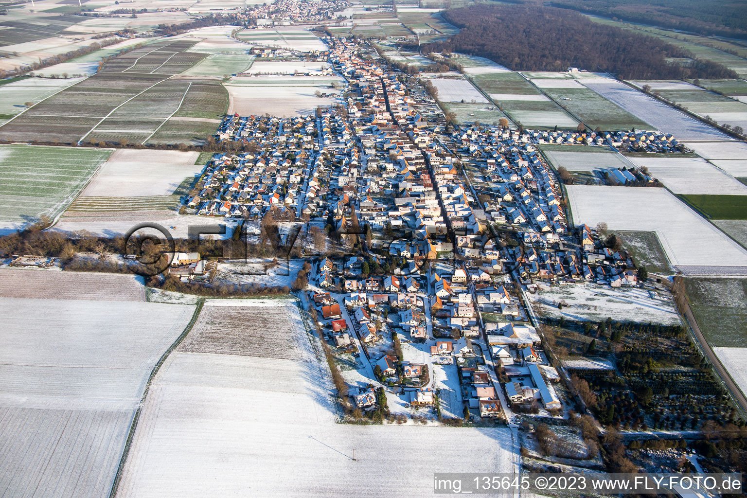 Aerial view of From the west in winter when there is snow in Freckenfeld in the state Rhineland-Palatinate, Germany
