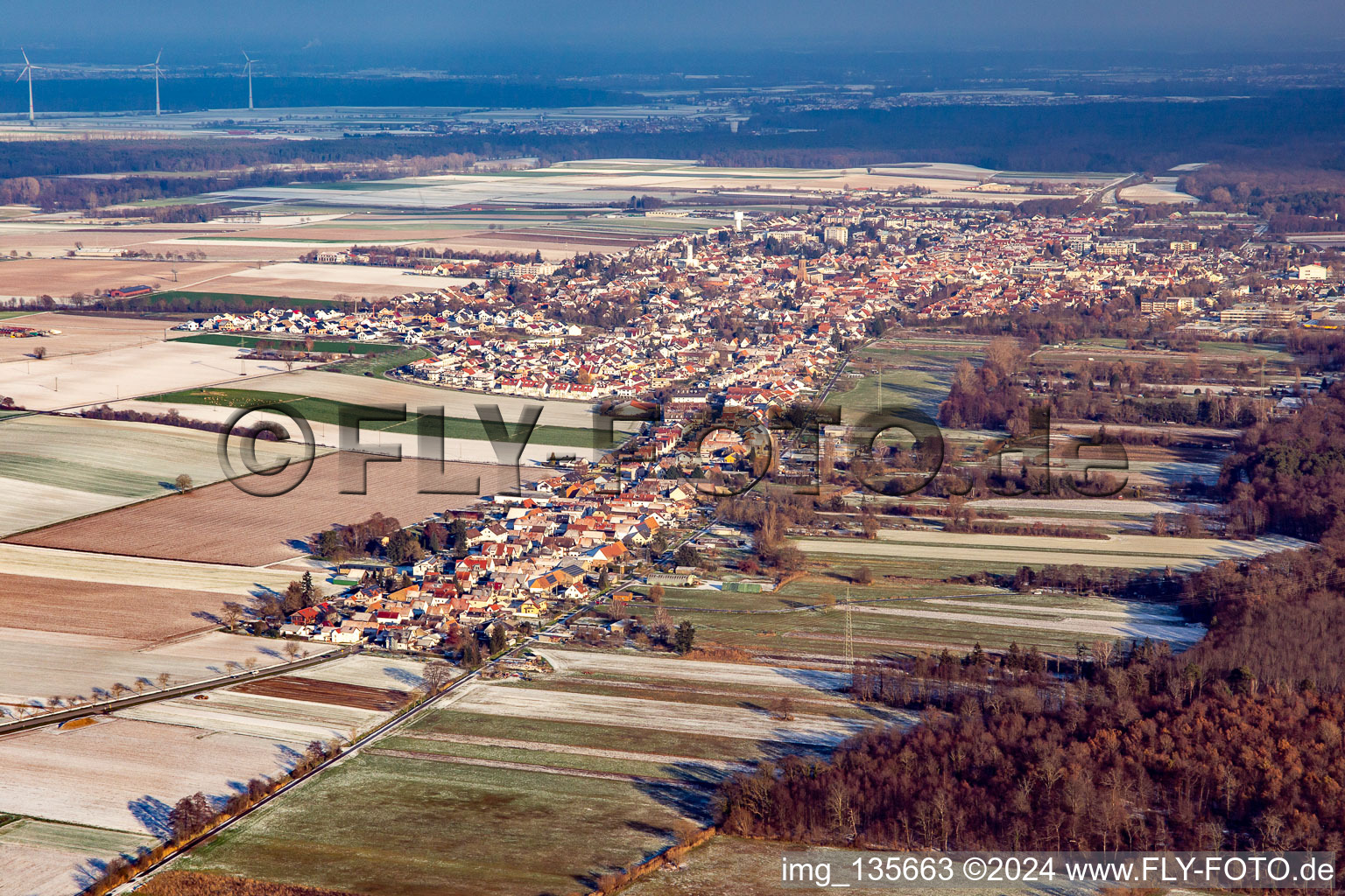 Saarstrasse from the west in winter with snow in Kandel in the state Rhineland-Palatinate, Germany