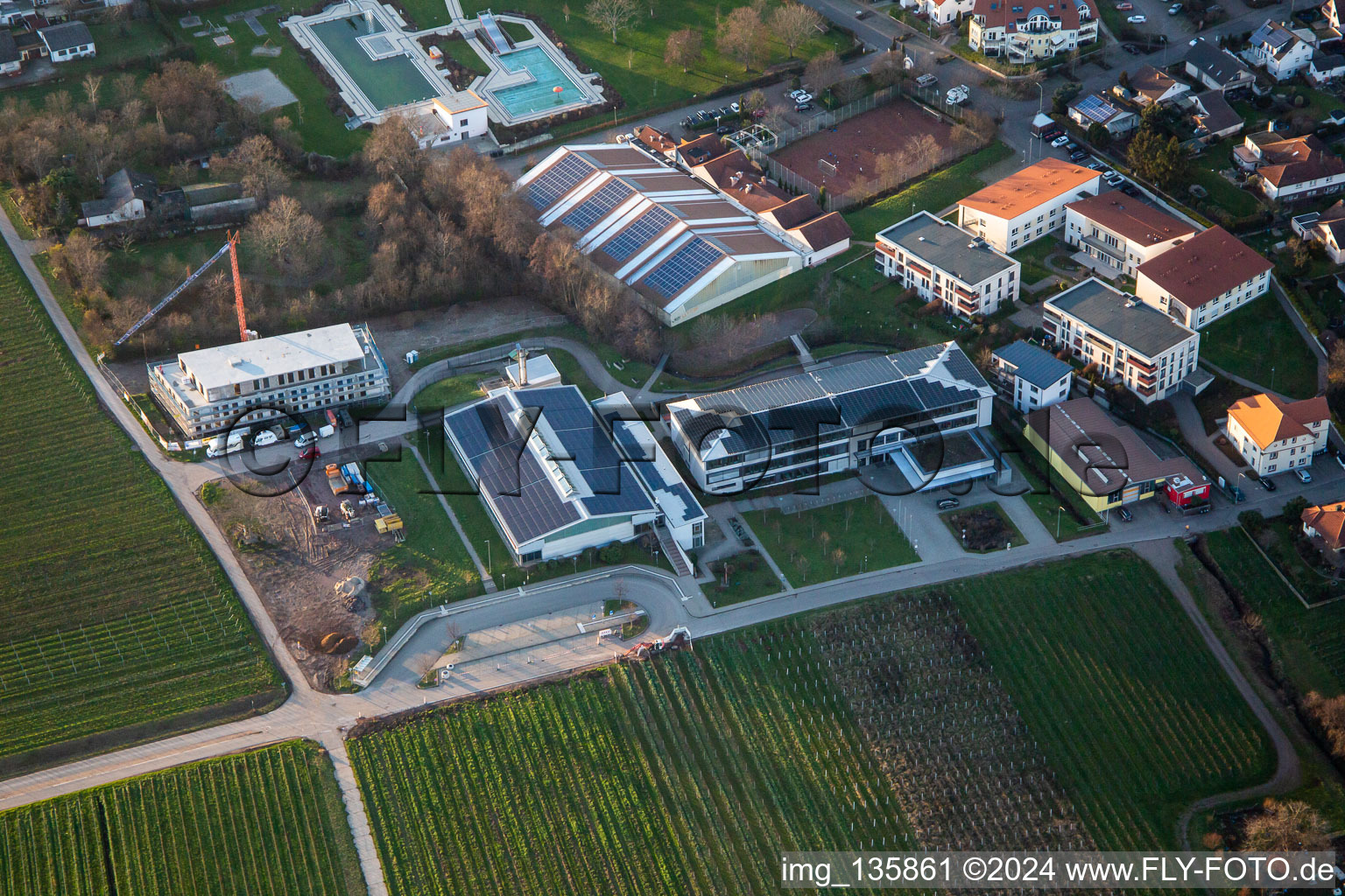 Gebrüder-Ullrich-Realschule plus in front of the outdoor pool / swimming pool Kalmitbad in Maikammer in the state Rhineland-Palatinate, Germany