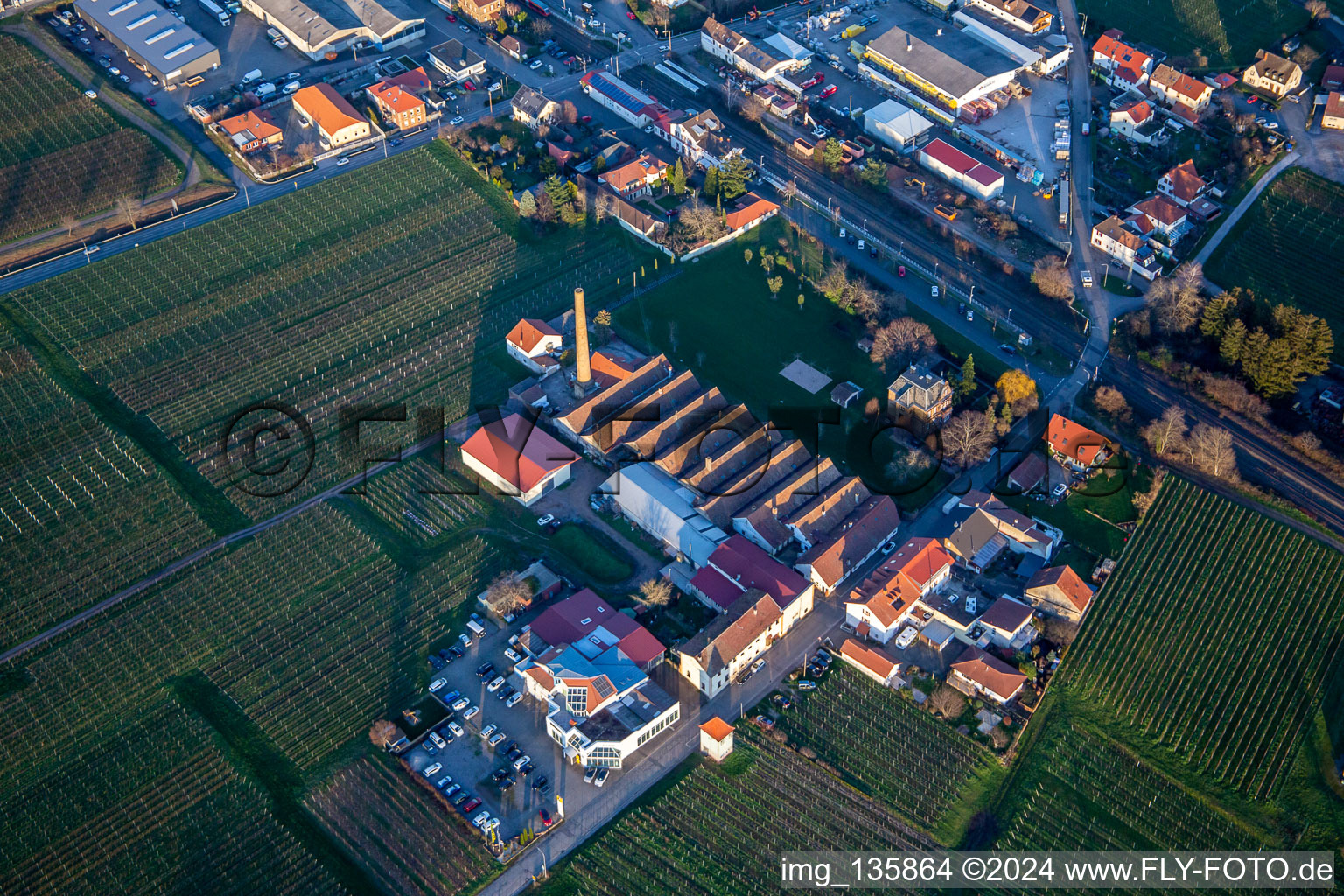 Aerial view of Renault Autohaus Schreieck GmbH in front of the Albert Götz KG winery in Kirrweiler in the state Rhineland-Palatinate, Germany