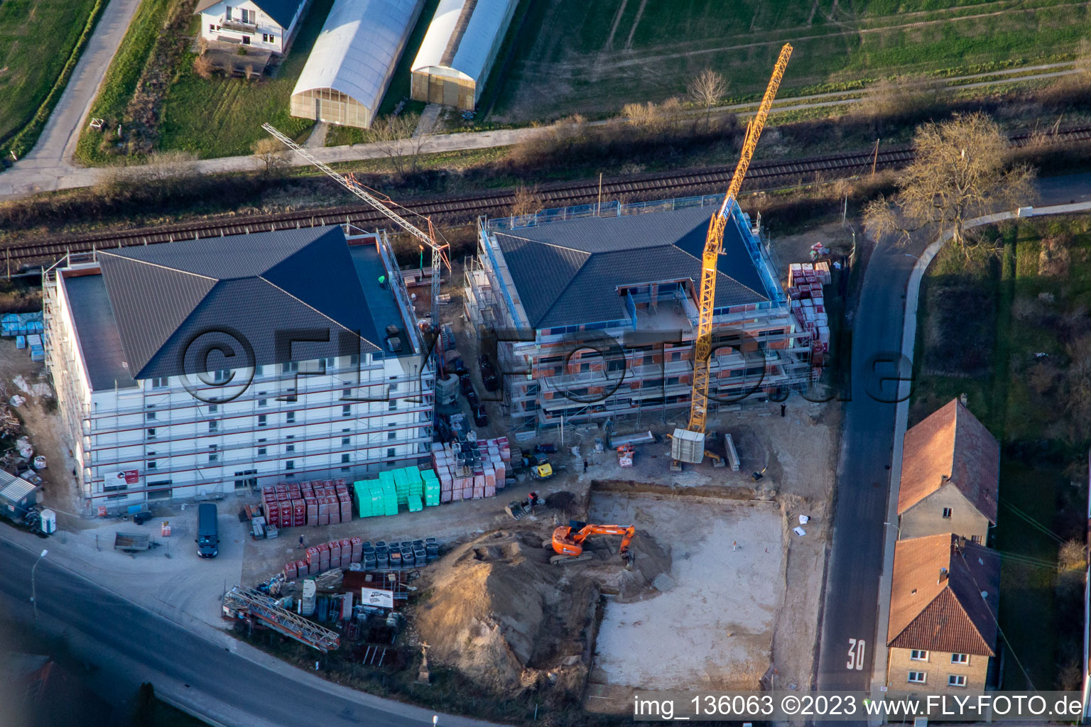 Aerial view of New construction of an age-appropriate apartment at the railway crossing in the district Schaidt in Wörth am Rhein in the state Rhineland-Palatinate, Germany