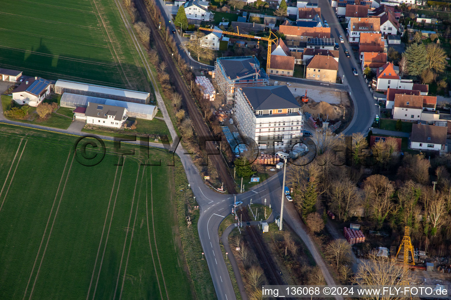 Aerial photograpy of New construction of age-appropriate apartment at the railway crossing in the district Schaidt in Wörth am Rhein in the state Rhineland-Palatinate, Germany