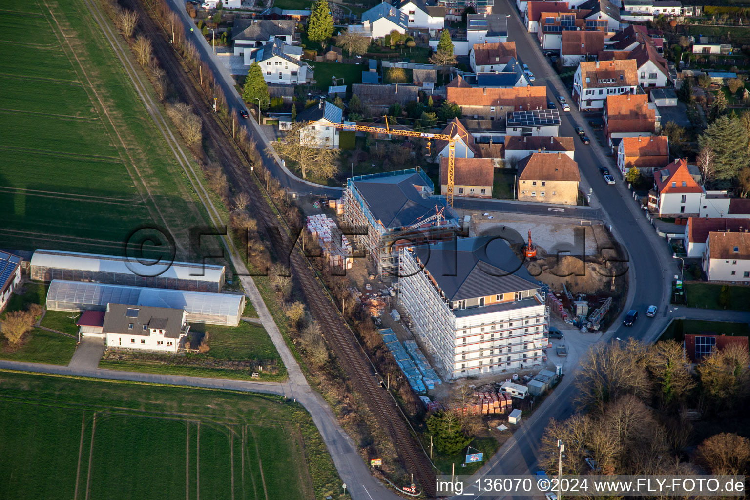 Oblique view of New construction of an age-appropriate apartment at the railway crossing in the district Schaidt in Wörth am Rhein in the state Rhineland-Palatinate, Germany