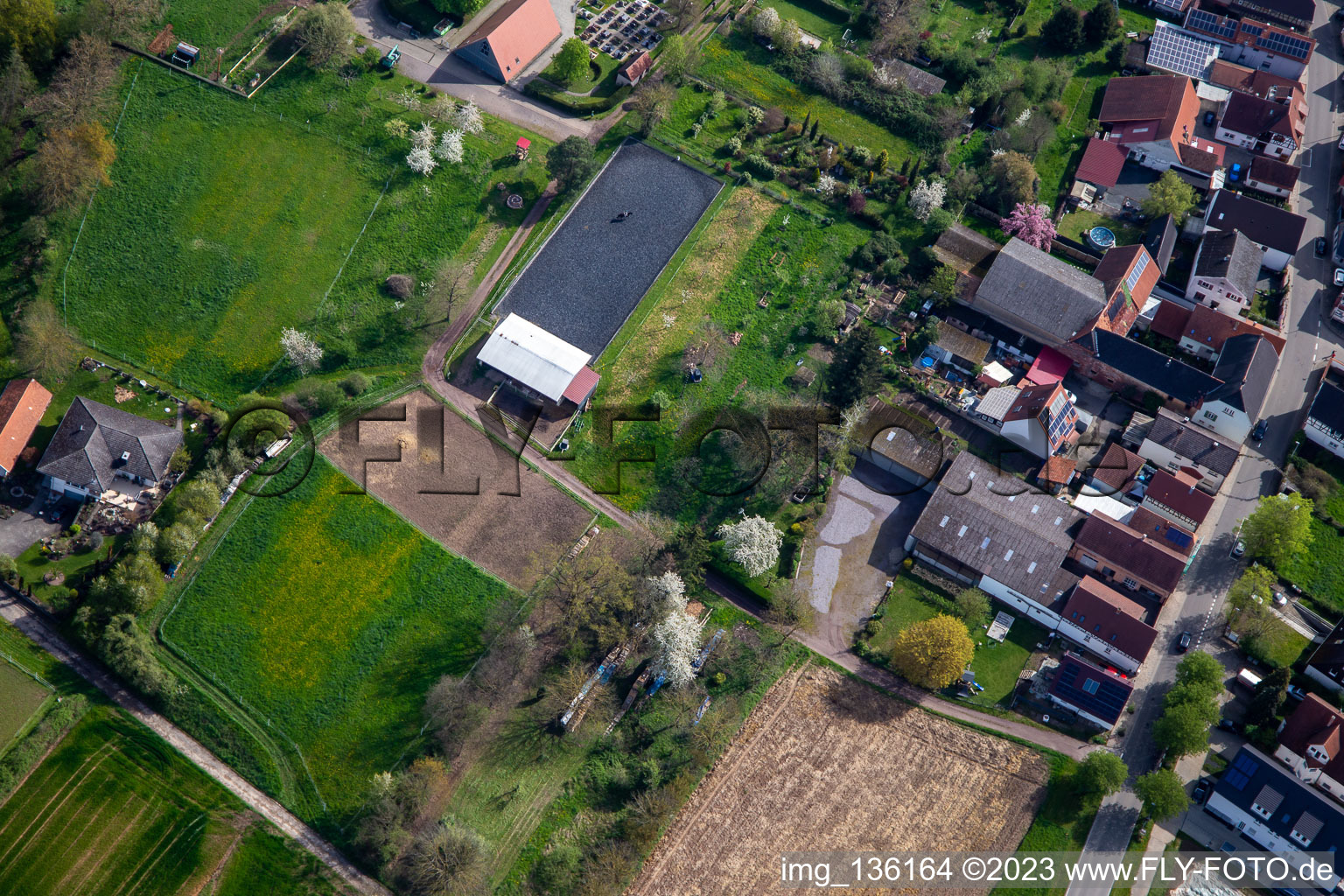 Equestrian facility at the cemetery in Winden in the state Rhineland-Palatinate, Germany from the plane