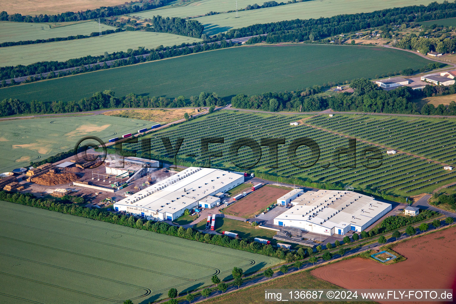 Pilzhof Pilzsubstrat Wallhausen GmbH in front of the solar field Wallhausen in Wallhausen in the state Saxony-Anhalt, Germany