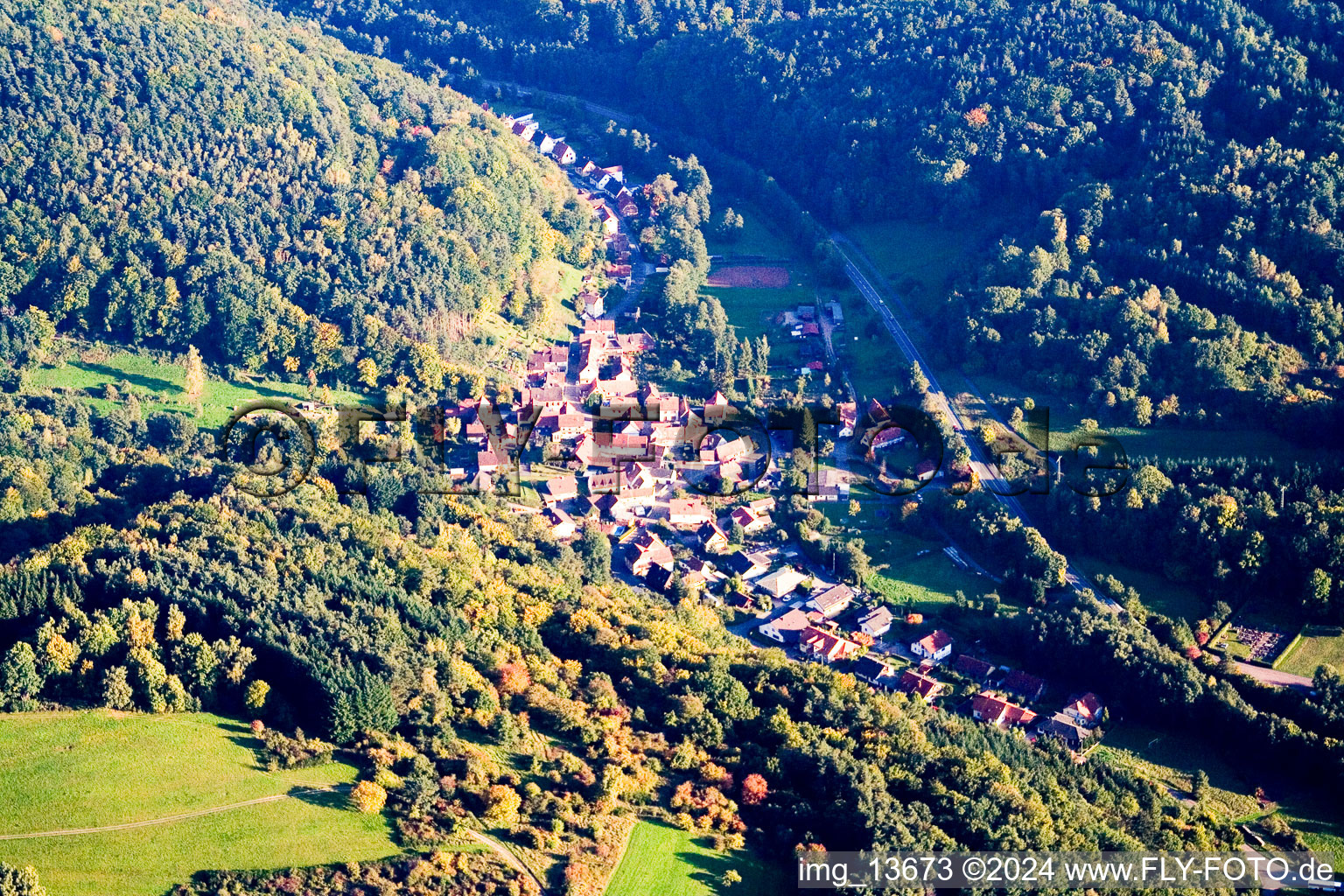 Village - view on the edge of agricultural fields and farmland in Muenchweiler am Klingbach in the state Rhineland-Palatinate