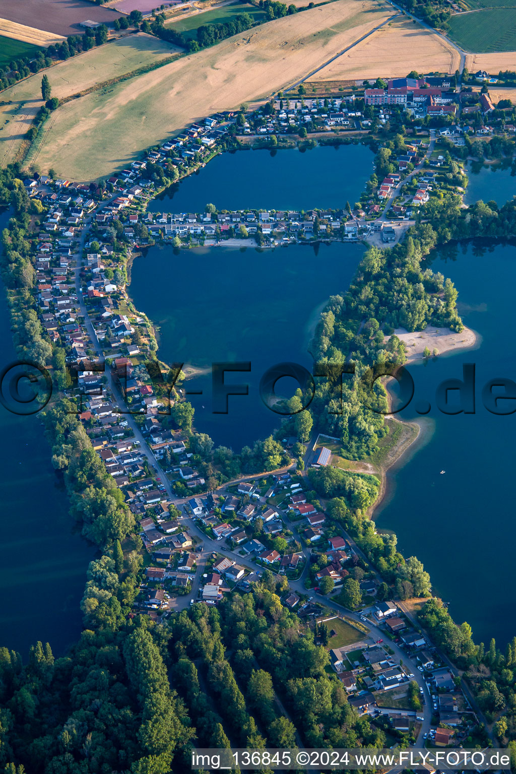 Sunny lake in Binsfeld in Speyer in the state Rhineland-Palatinate, Germany