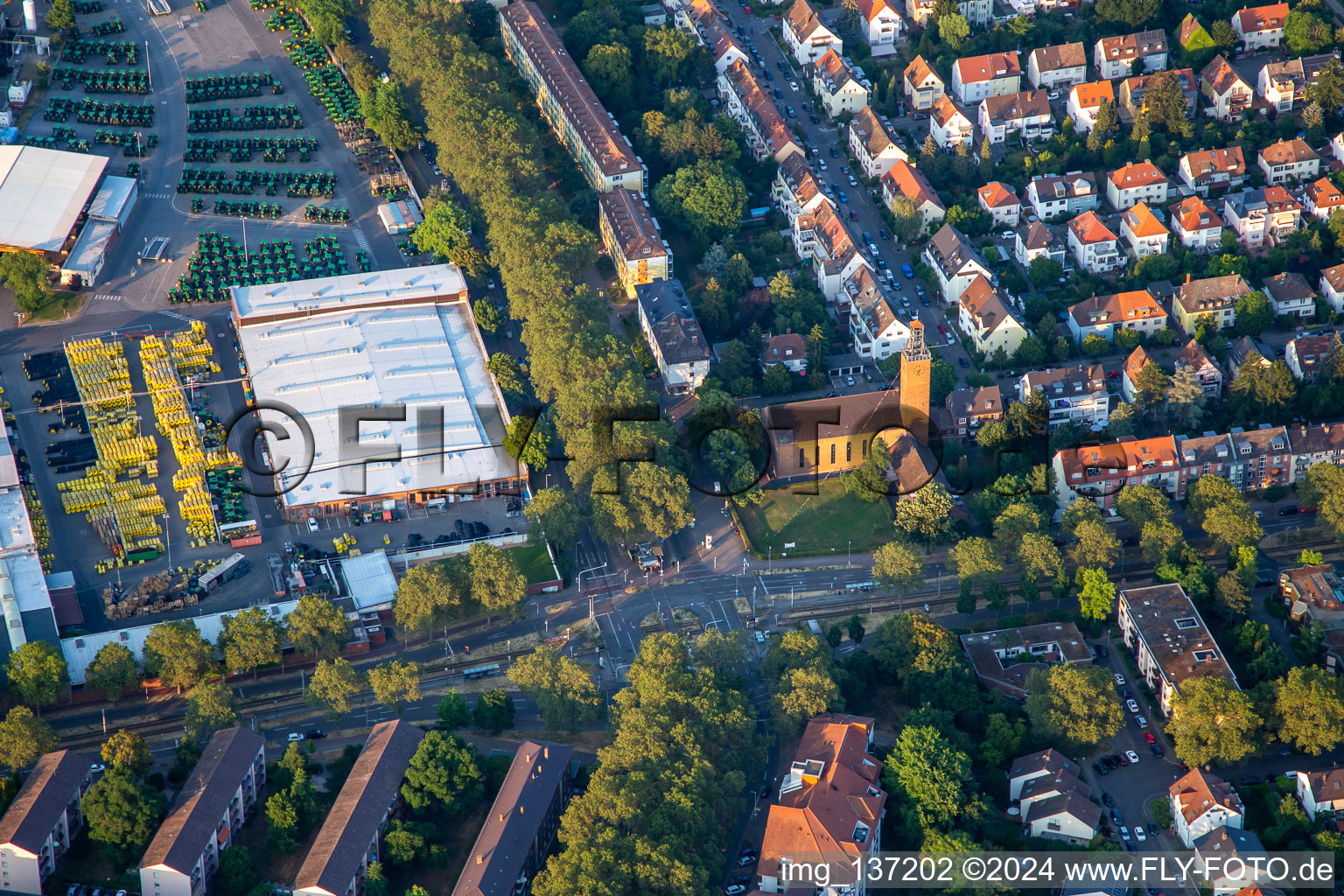 John Deere next to St. Mark's Church in the district Almenhof in Mannheim in the state Baden-Wuerttemberg, Germany