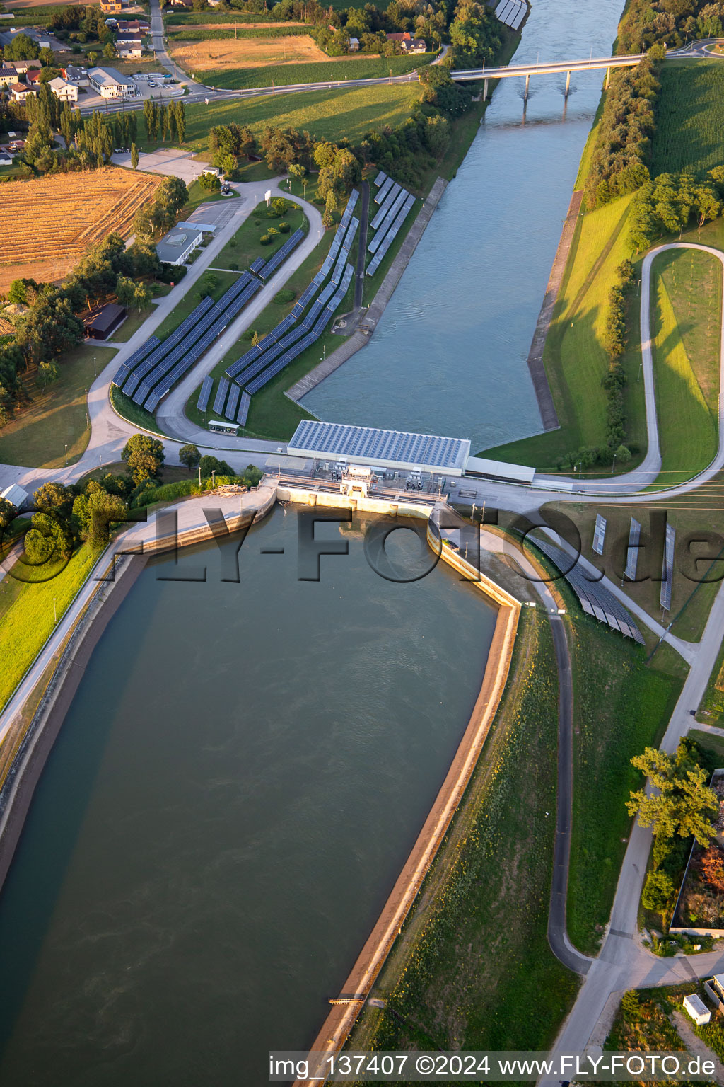 Aerial view of Hydroelectric power plant HE Zlatoličje with photovoltaic panels on the embankment of the Drava Canal HE Zlatoličje in Starše in the state Slovenia, Slovenia