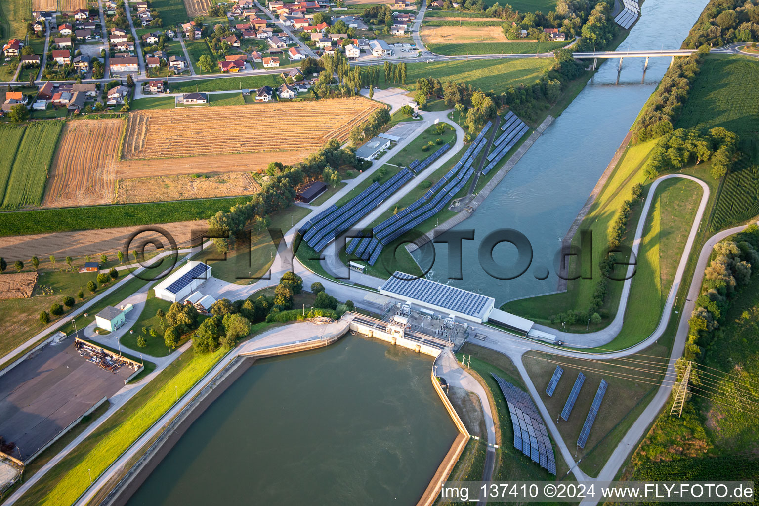 Aerial photograpy of Hydroelectric power plant HE Zlatoličje with photovoltaic panels on the embankment of the Drava Canal HE Zlatoličje in Starše in the state Slovenia, Slovenia