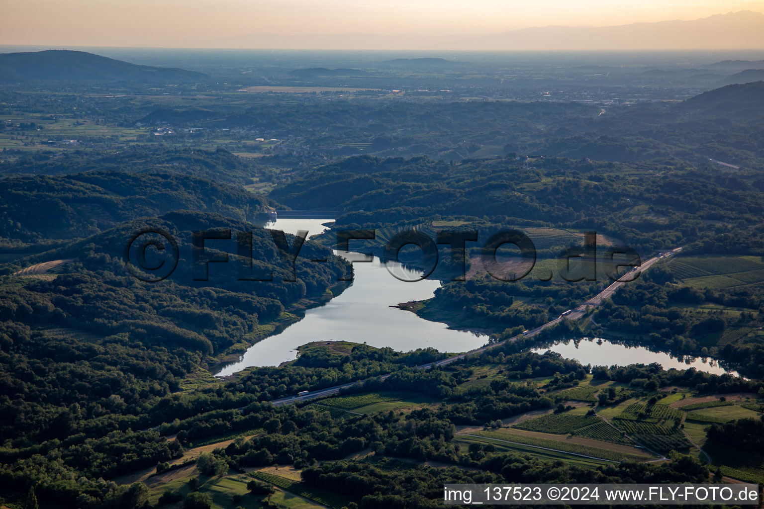 Aerial view of Vogrscek reservoir under the motorway bridge in Ajdovščina in the state Slovenia, Slovenia