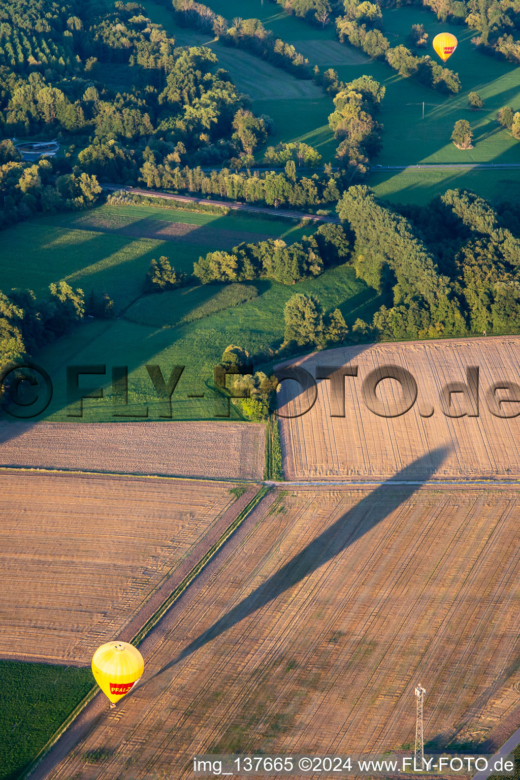 Aerial view of PfalzGas hot air balloons landed in Billigheim-Ingenheim in the state Rhineland-Palatinate, Germany