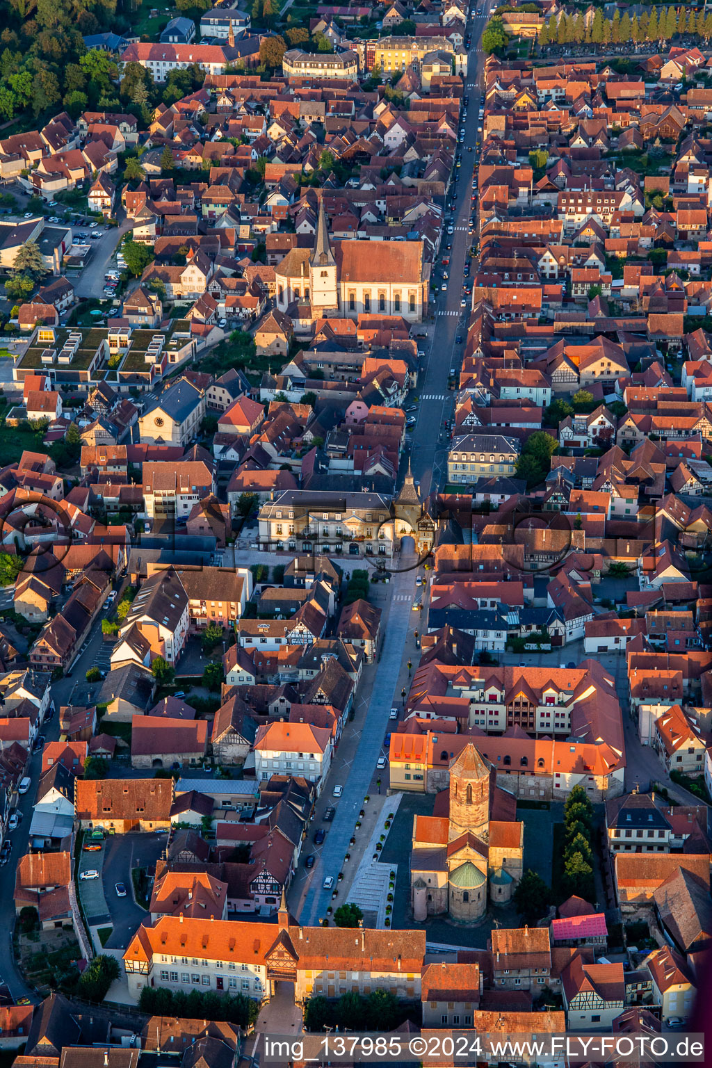 Aerial view of Rue du Gén de Gaulle with Porte basse ou Porte de la Vierge, Tour de l'Ecole, Tour de l'Horloge ou Zittgloeckel and Eglise catholique Saint-Etienne in Rosheim in the state Bas-Rhin, France