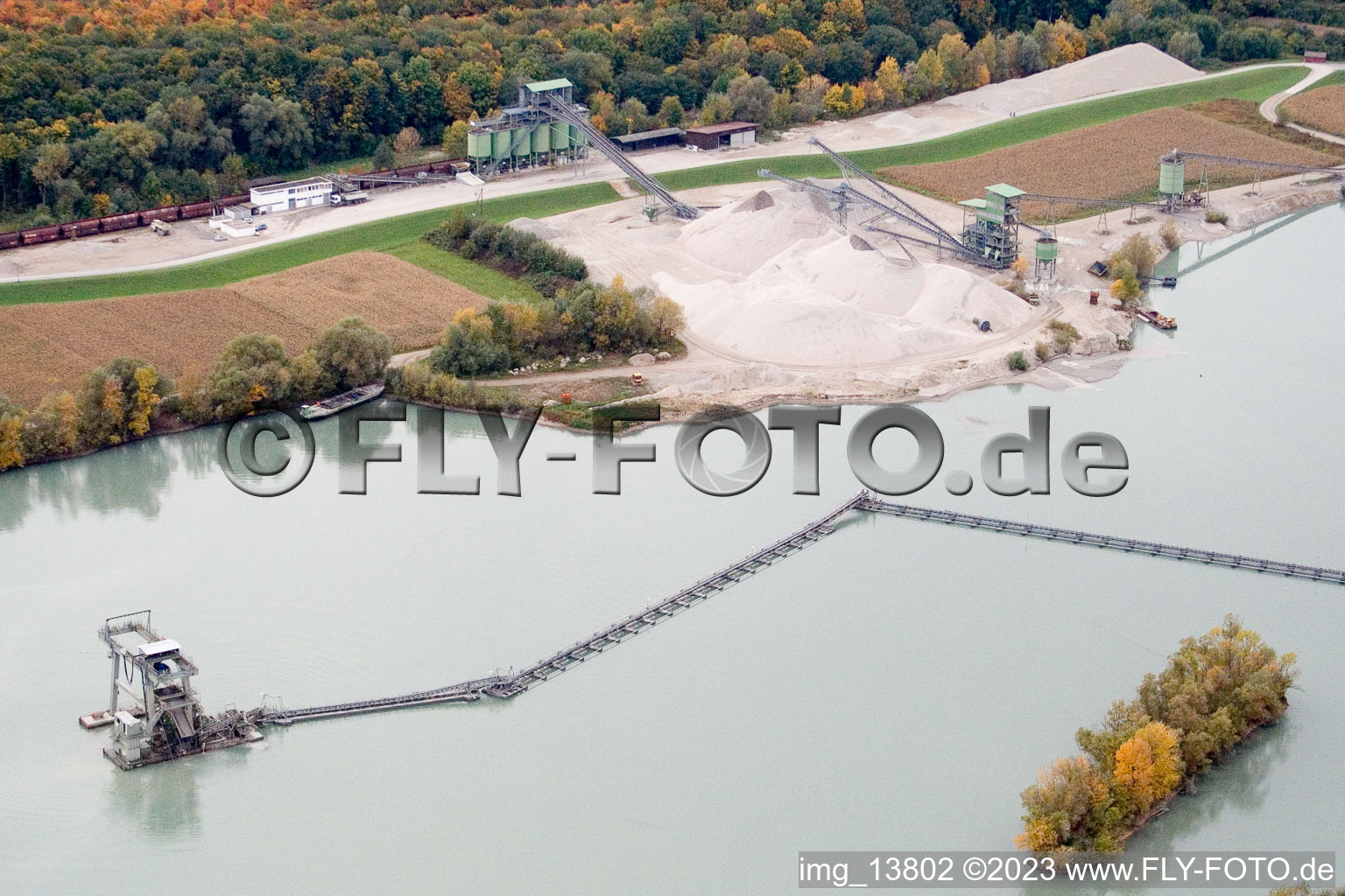 Oblique view of Gravel quarry lake in Hagenbach in the state Rhineland-Palatinate, Germany