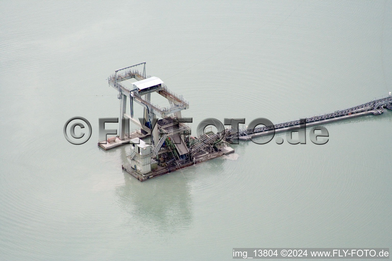 Gravel quarry lake in Hagenbach in the state Rhineland-Palatinate, Germany out of the air