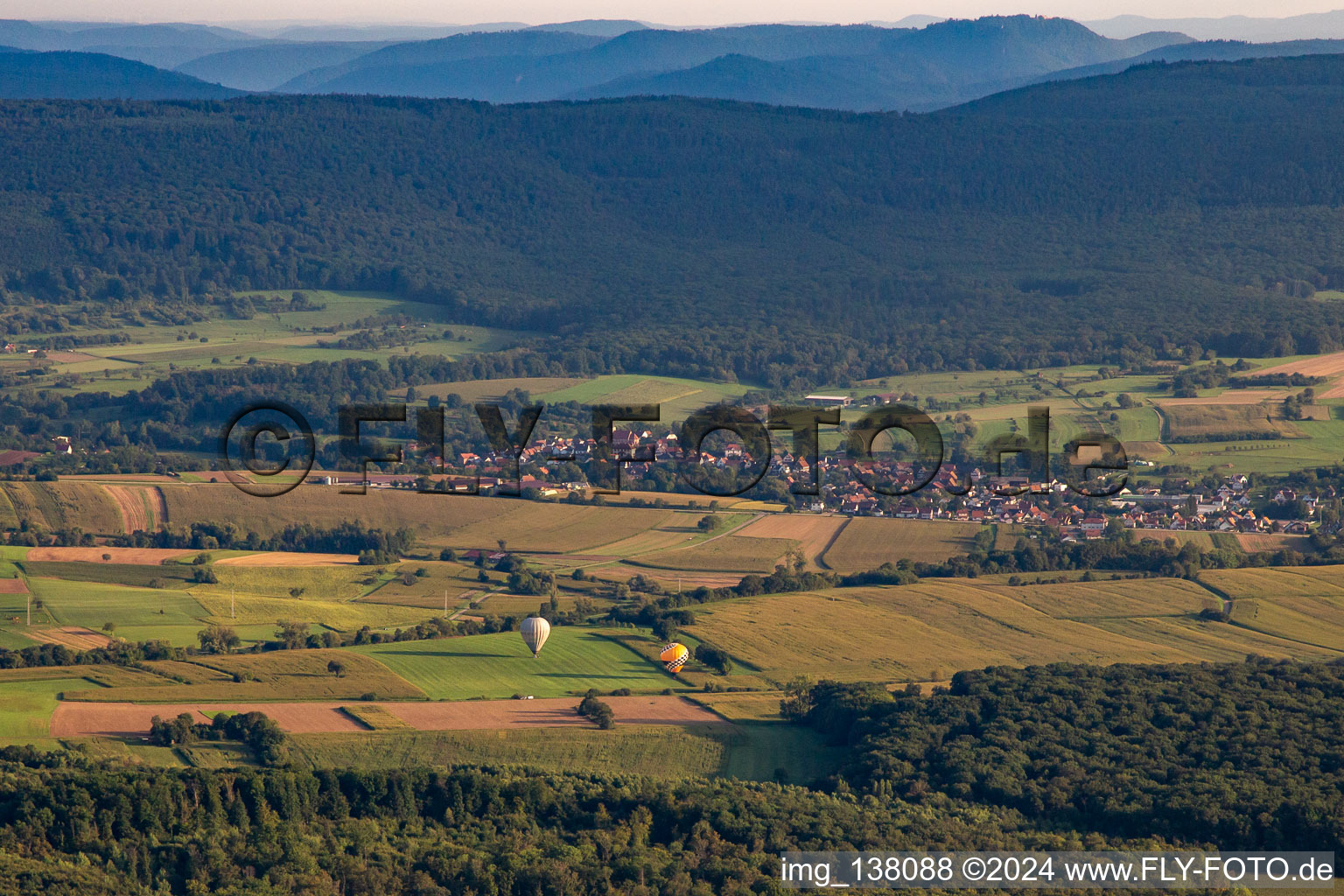 Landing of two hot air balloons in Morsbronn-les-Bains in the state Bas-Rhin, France