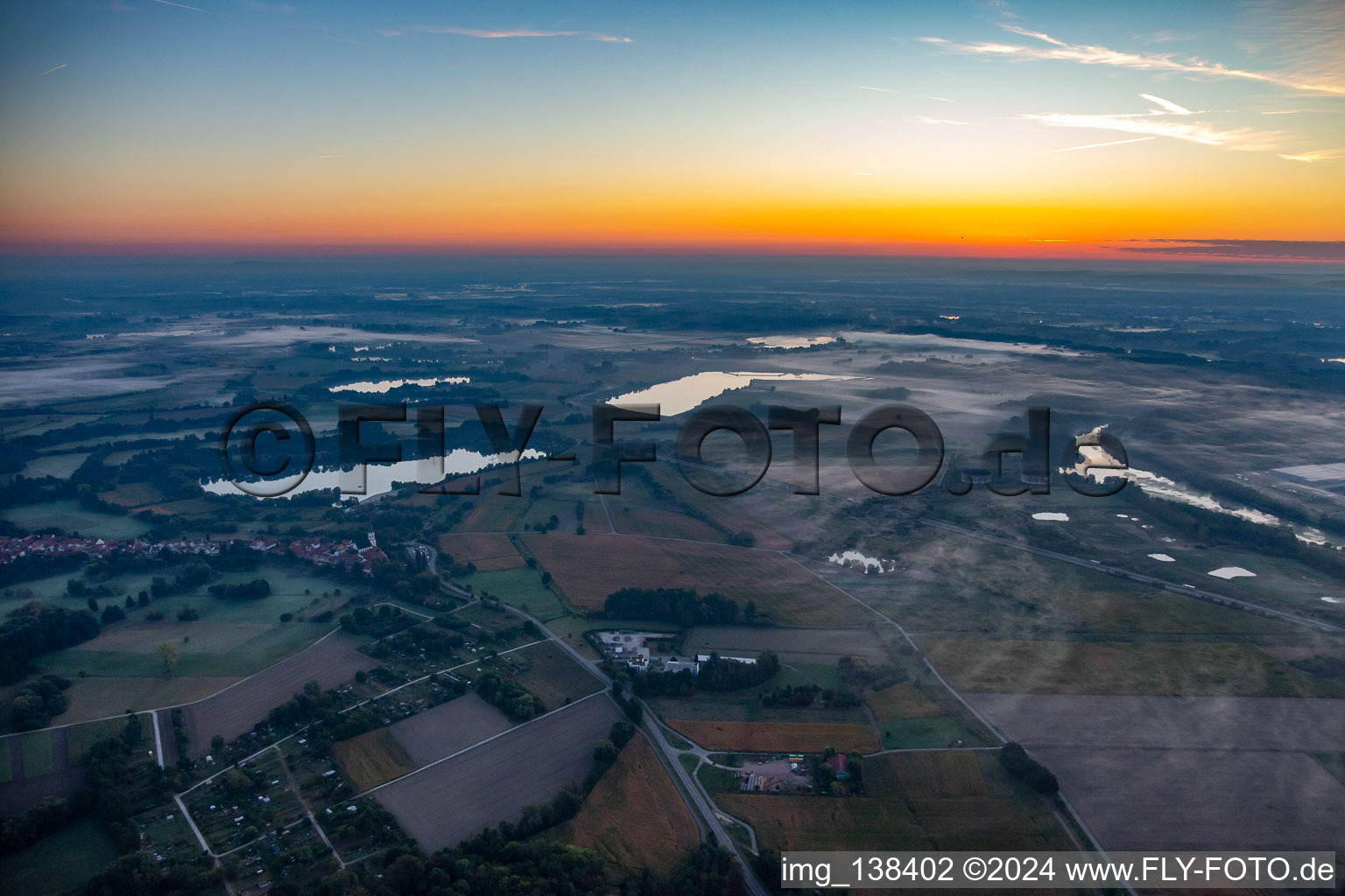 Quarry ponds and the upper Old Rhine before sunrise in Jockgrim in the state Rhineland-Palatinate, Germany