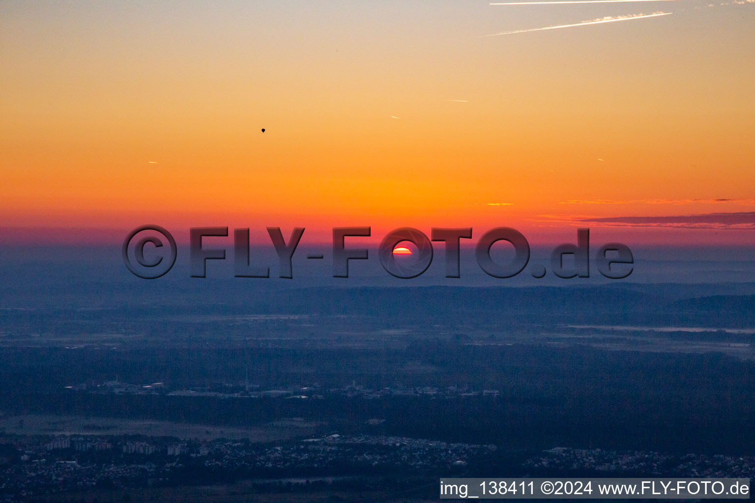 Sunrise with hot air balloon over KIT Campus North in the district Leopoldshafen in Eggenstein-Leopoldshafen in the state Baden-Wuerttemberg, Germany