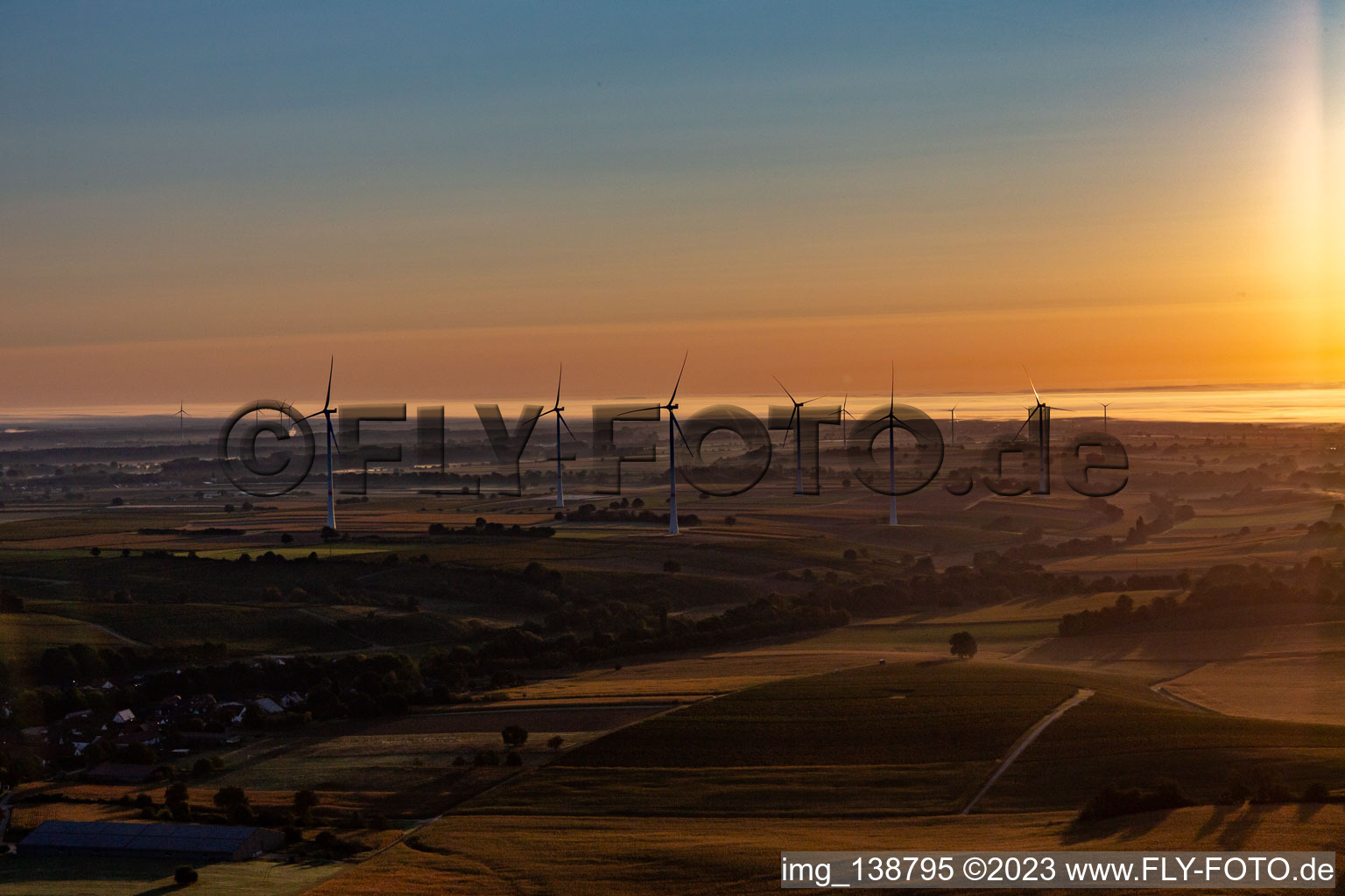 Wind farm Freckenfeld at sunrise in Freckenfeld in the state Rhineland-Palatinate, Germany