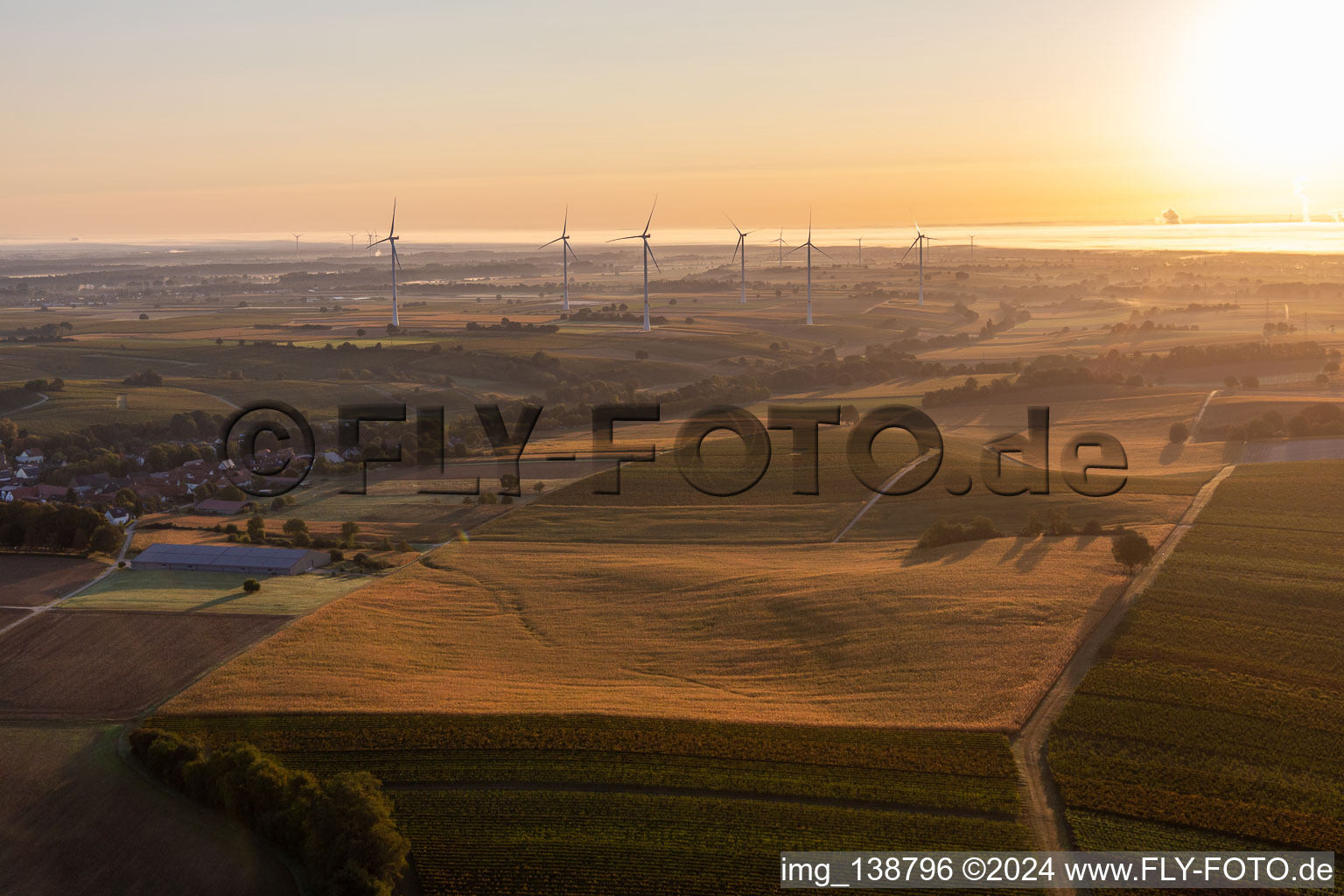 Freckenfeld wind farm from the west at sunrise in Vollmersweiler in the state Rhineland-Palatinate, Germany